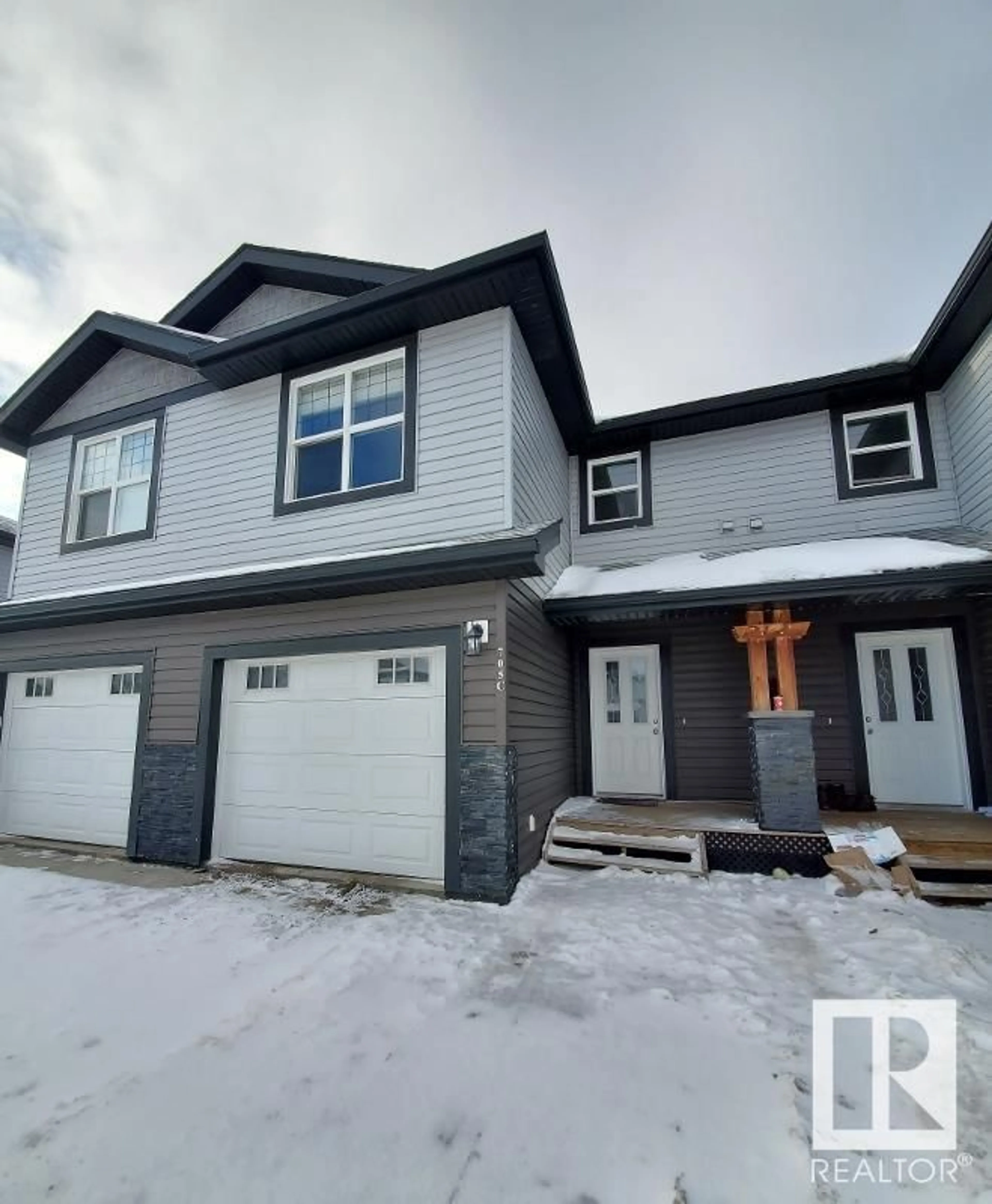 Home with vinyl exterior material, street for 705C Rocky WY, Cold Lake Alberta T9M0H3