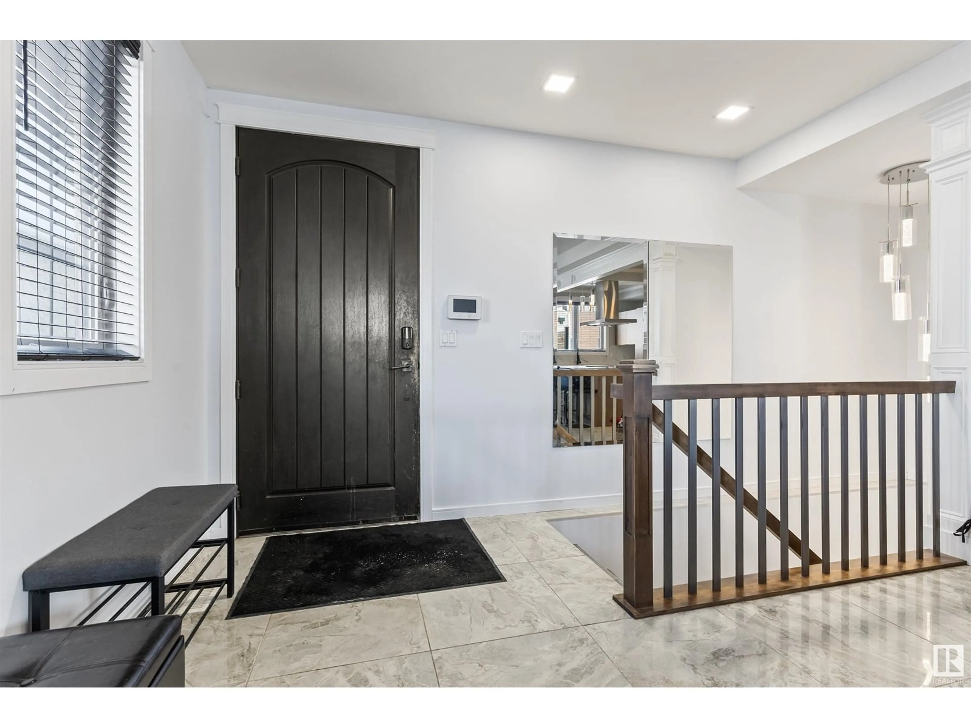 Indoor entryway for 10922 96 ST NW, Edmonton Alberta T5H2K3