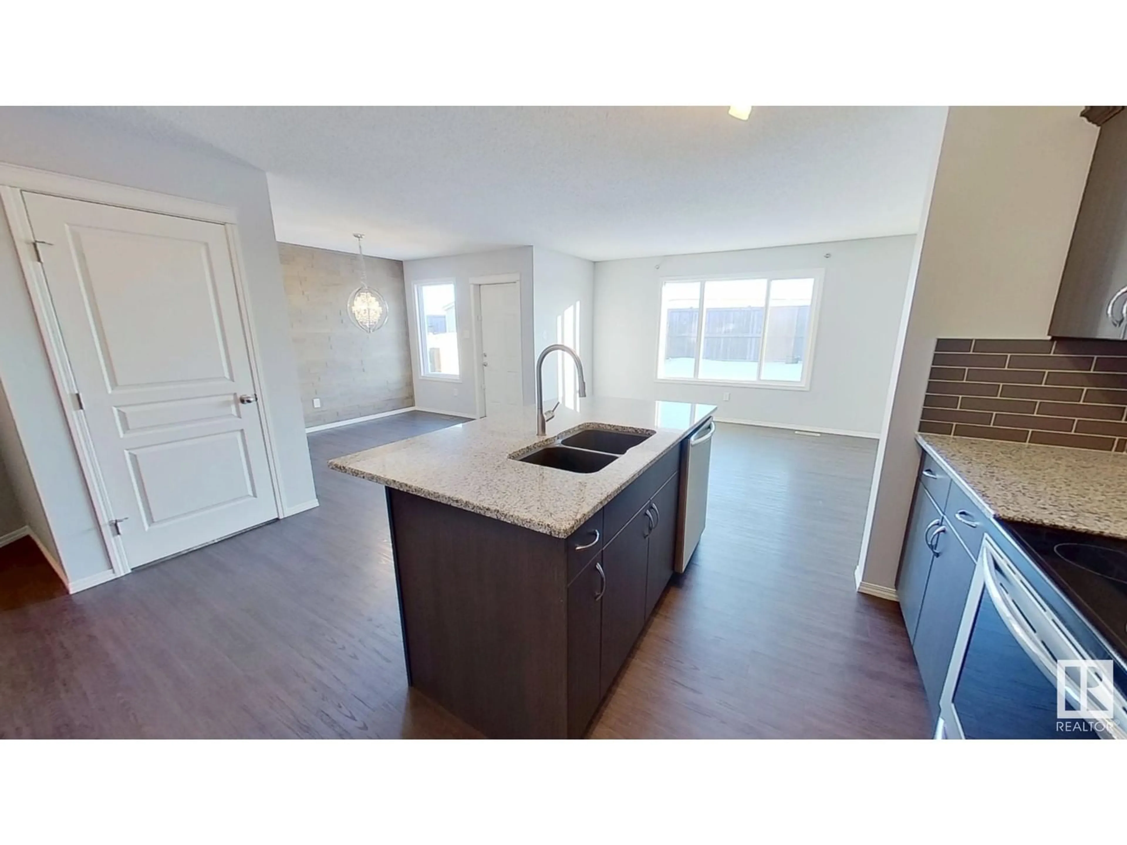 Open concept kitchen, unknown for 17043 38 ST NW, Edmonton Alberta T5Y3S1