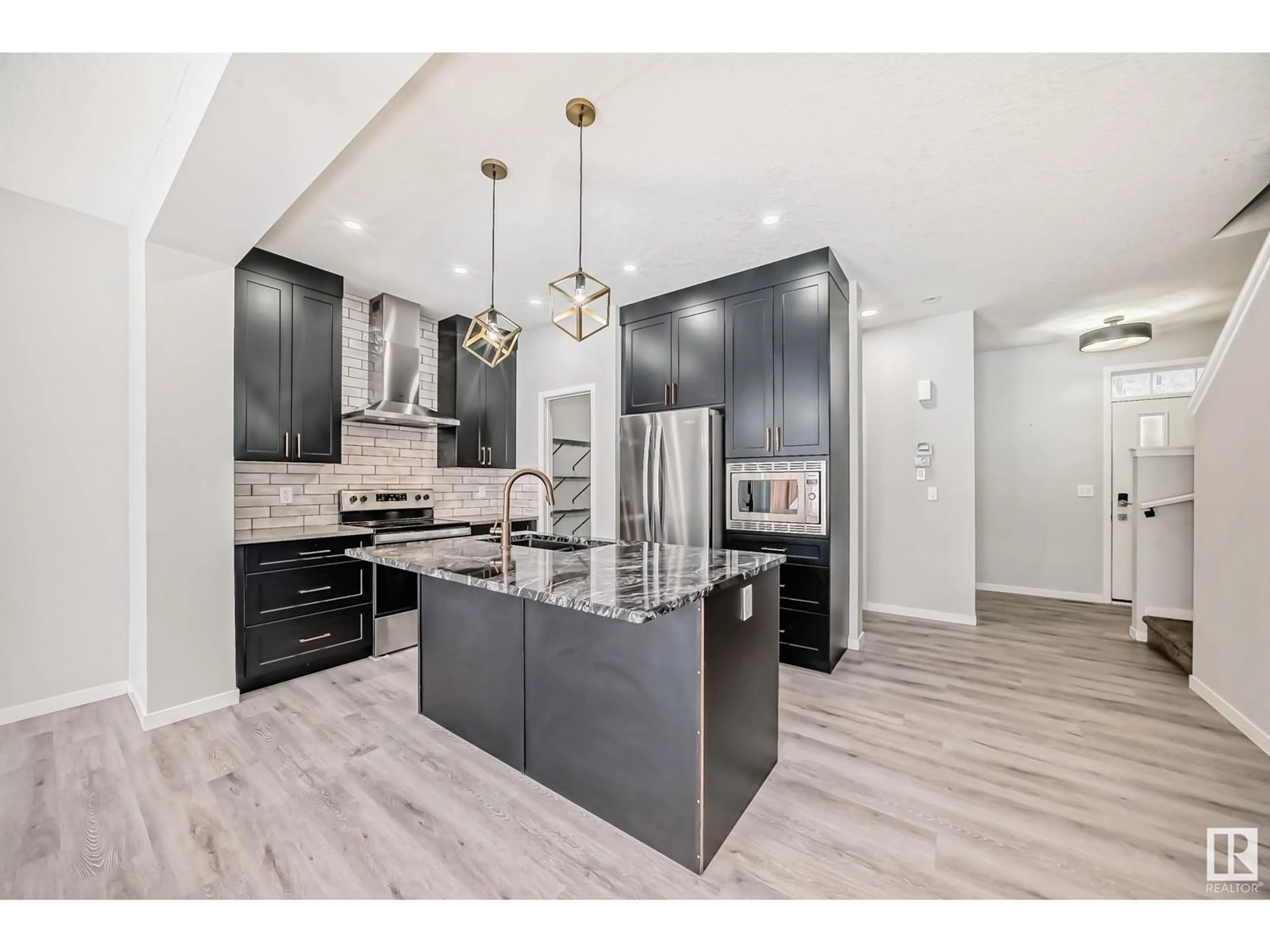 Open concept kitchen, unknown for 2347 51 ST SW, Edmonton Alberta T6X3A4