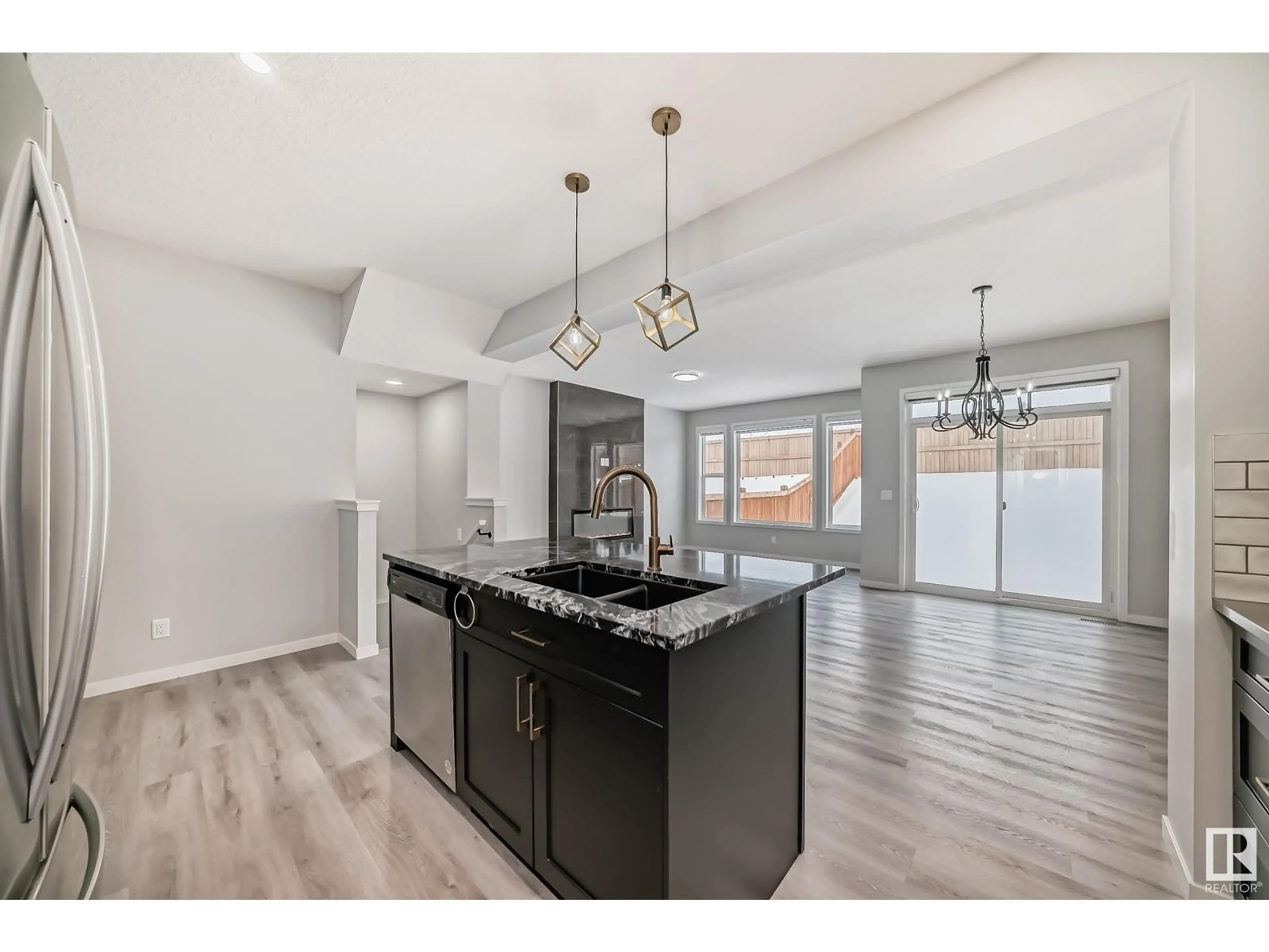 Open concept kitchen, unknown for 2347 51 ST SW, Edmonton Alberta T6X3A4