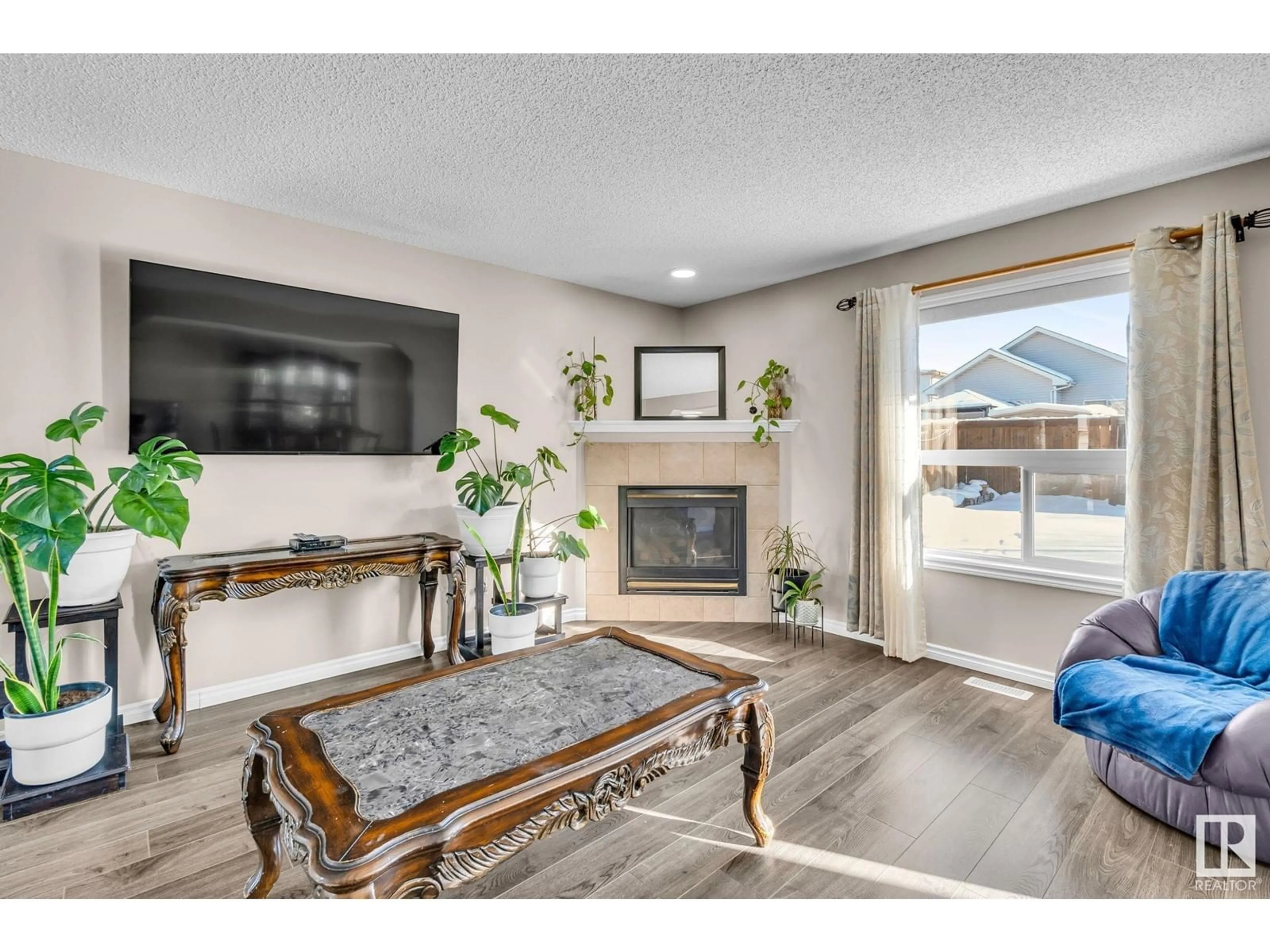 Living room with furniture, unknown for 3511 20 ST NW, Edmonton Alberta T6T1Y2