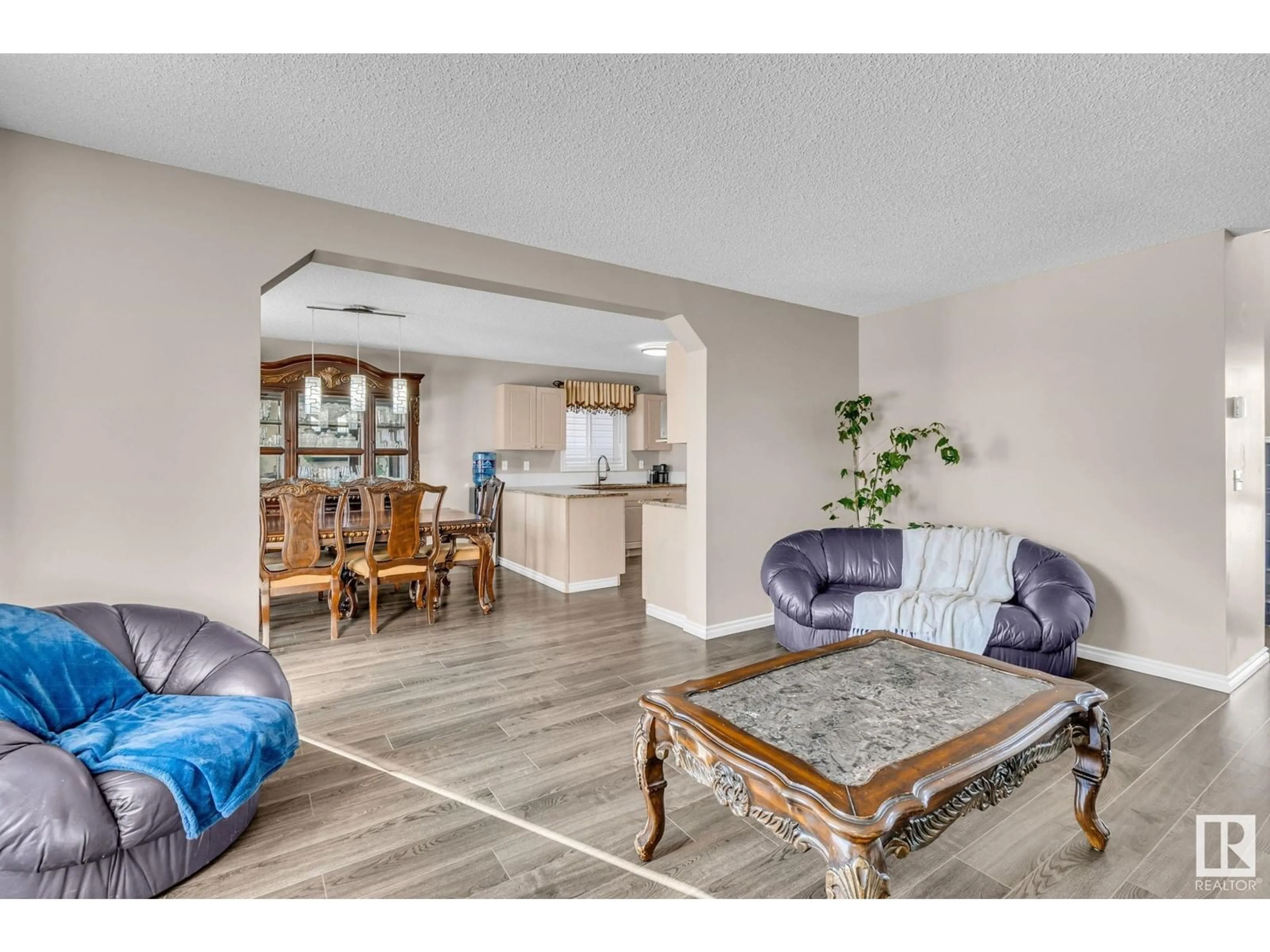 Living room with furniture, ceramic/tile floor for 3511 20 ST NW, Edmonton Alberta T6T1Y2