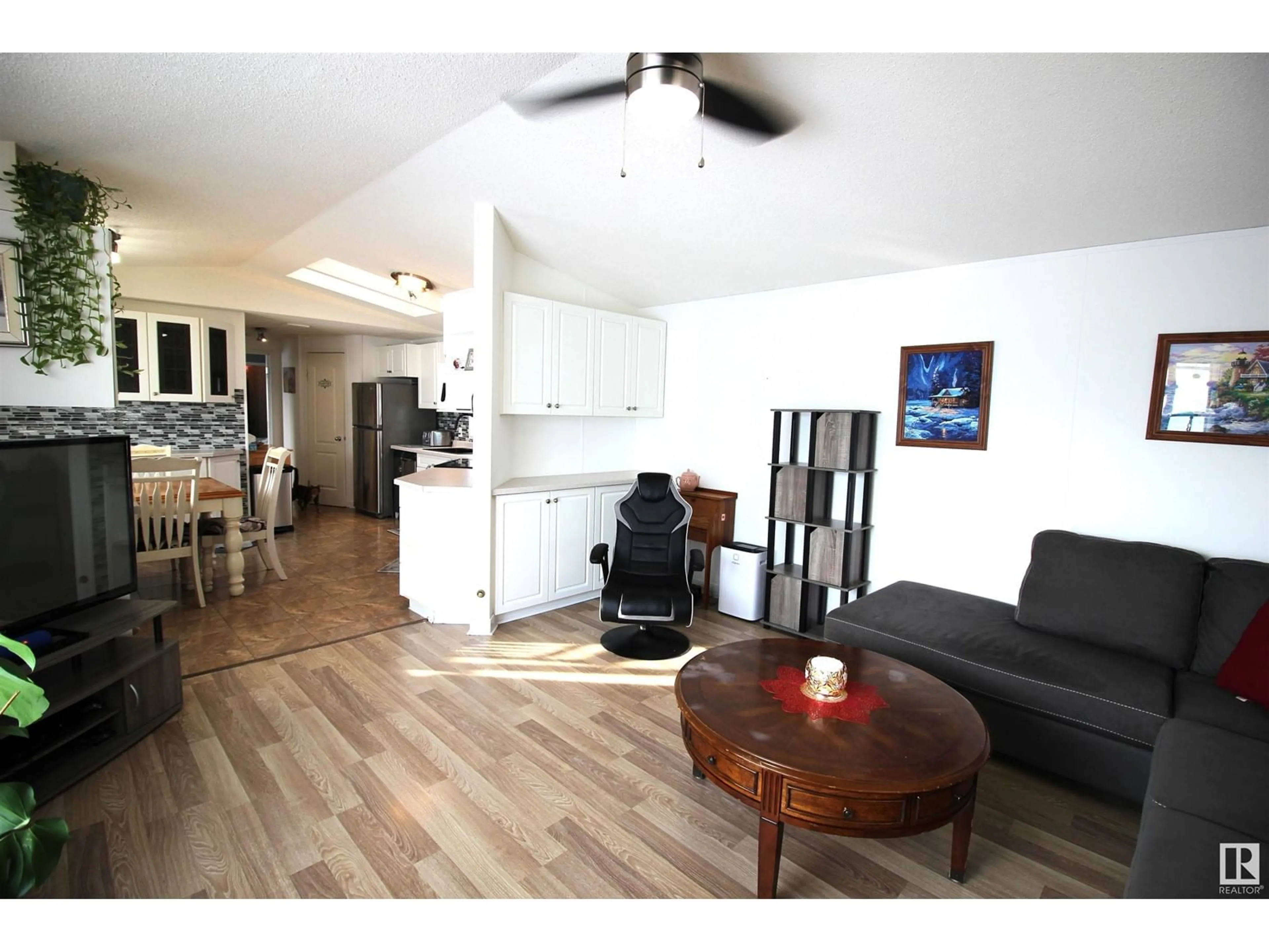 Living room with furniture, wood/laminate floor for 2643 Lakeview DR NW, Edmonton Alberta T5S1T5