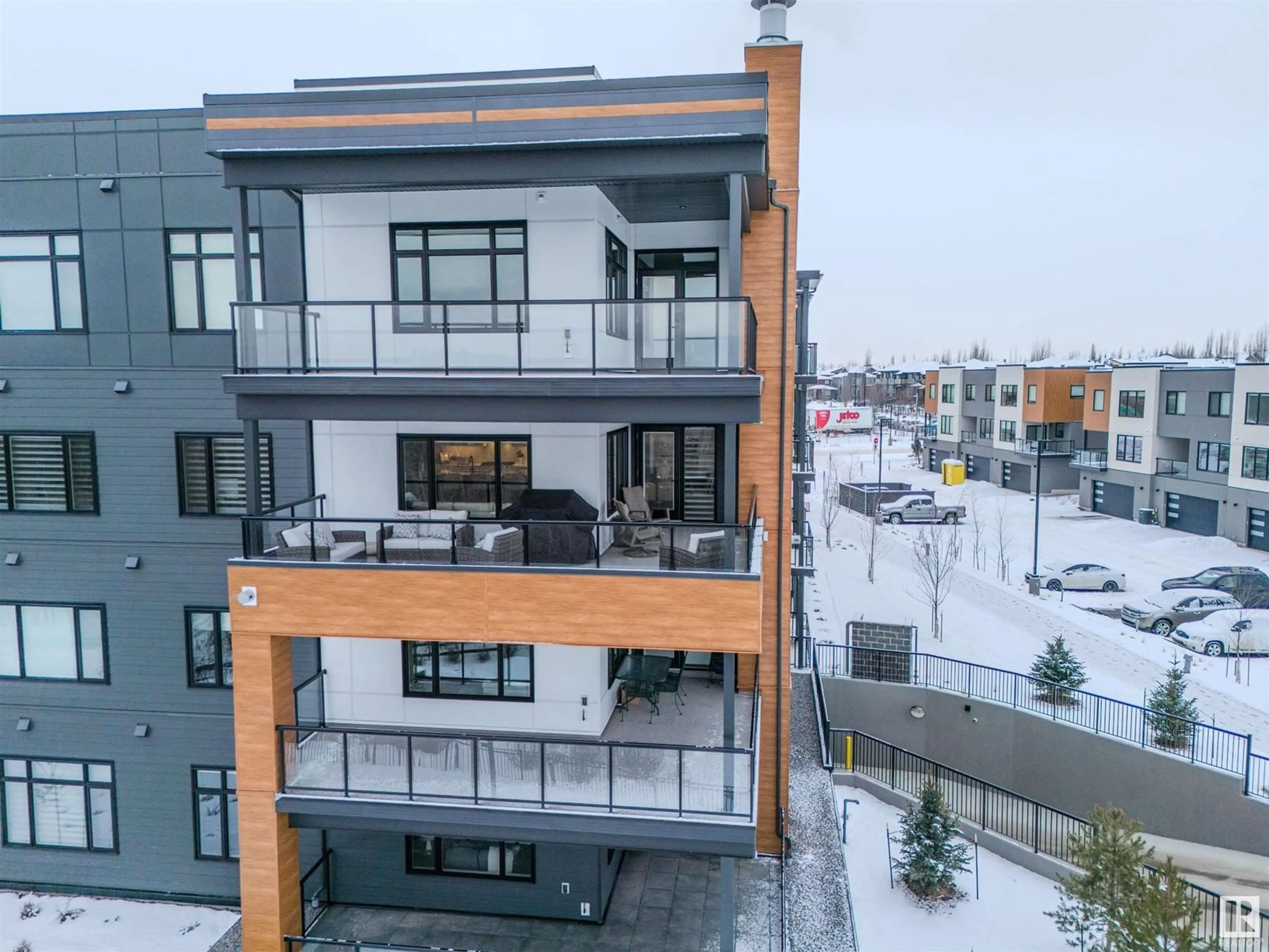 A pic from outside/outdoor area/front of a property/back of a property/a pic from drone, unknown for 310 - 7471 MAY COMMON NW, Edmonton Alberta T6R0X5