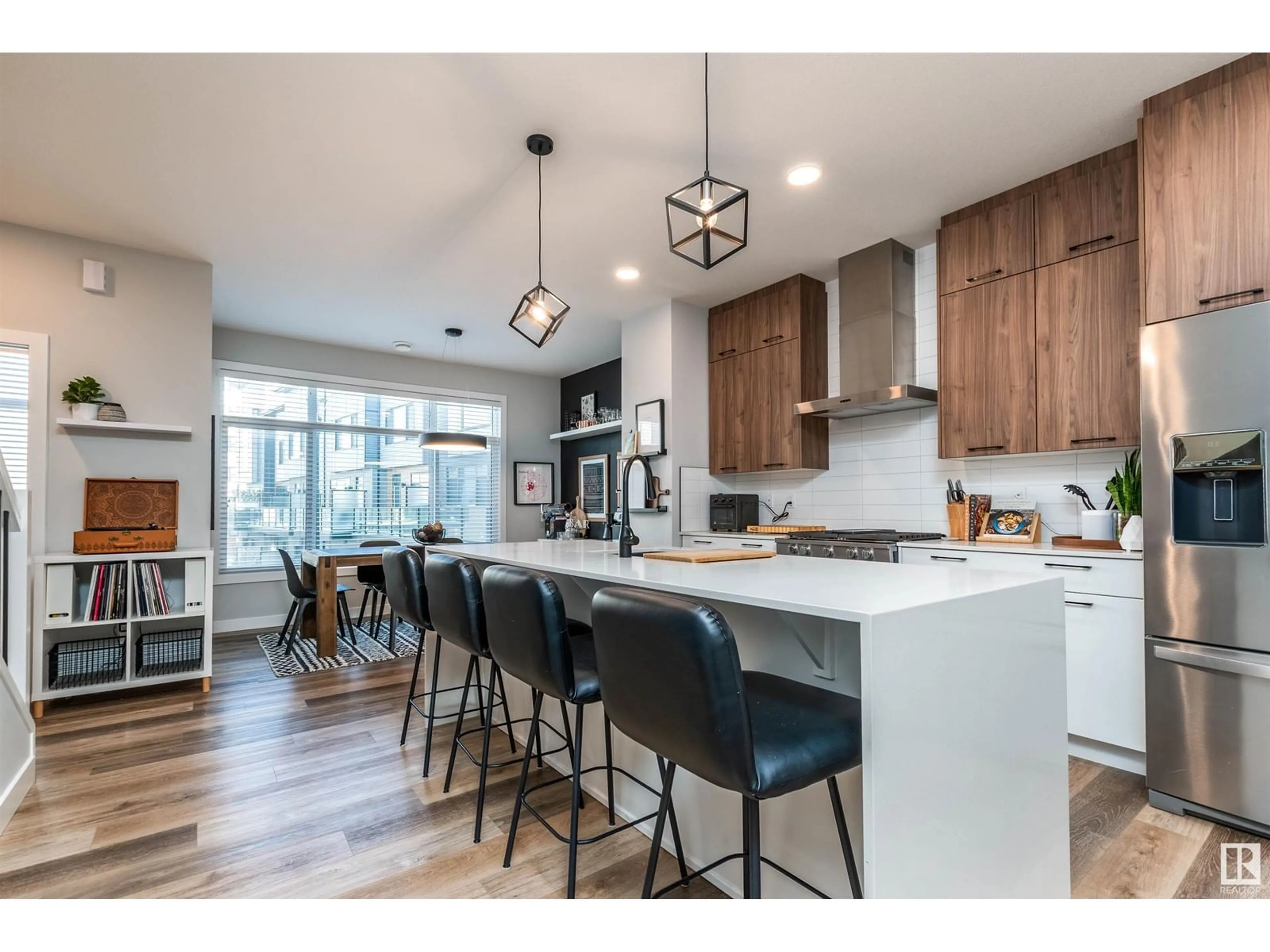 Open concept kitchen, wood/laminate floor for #54 50 EBONY BV, Sherwood Park Alberta T8H2X4