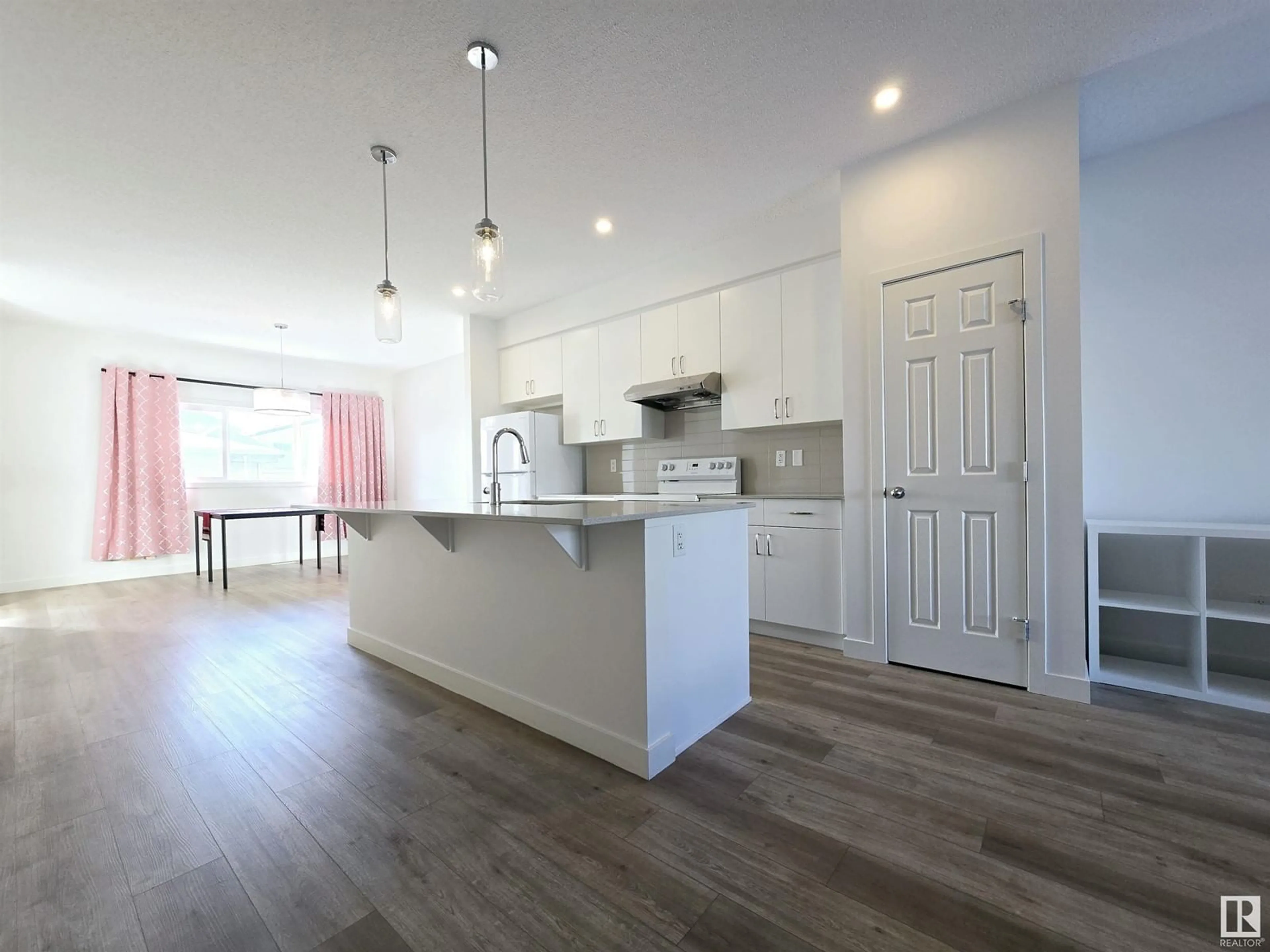 Open concept kitchen, unknown for 15651 18 AV SW, Edmonton Alberta T6W5C2