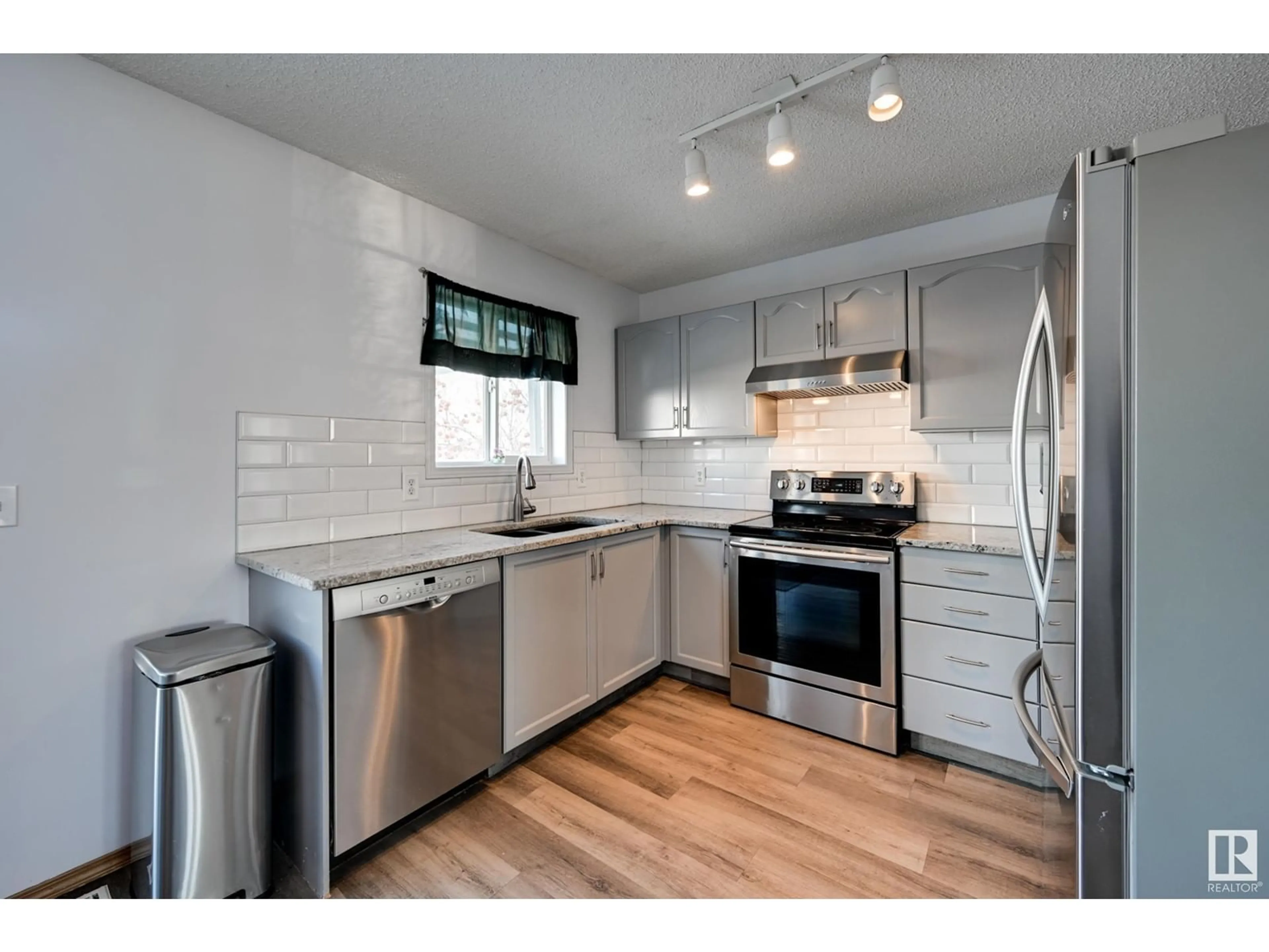 Open concept kitchen, unknown for 15039 135 ST NW, Edmonton Alberta T6V1M9