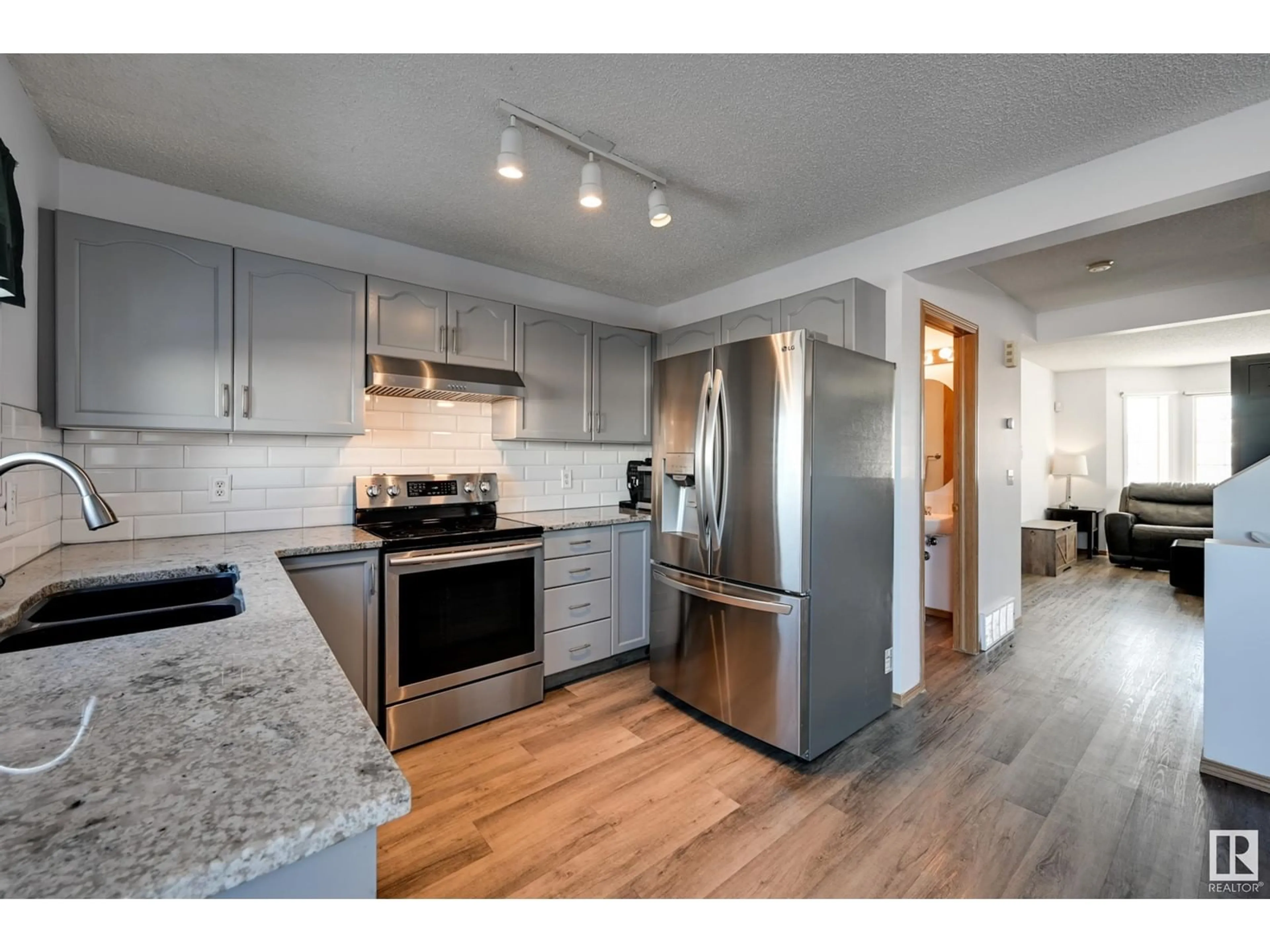 Open concept kitchen, unknown for 15039 135 ST NW, Edmonton Alberta T6V1M9