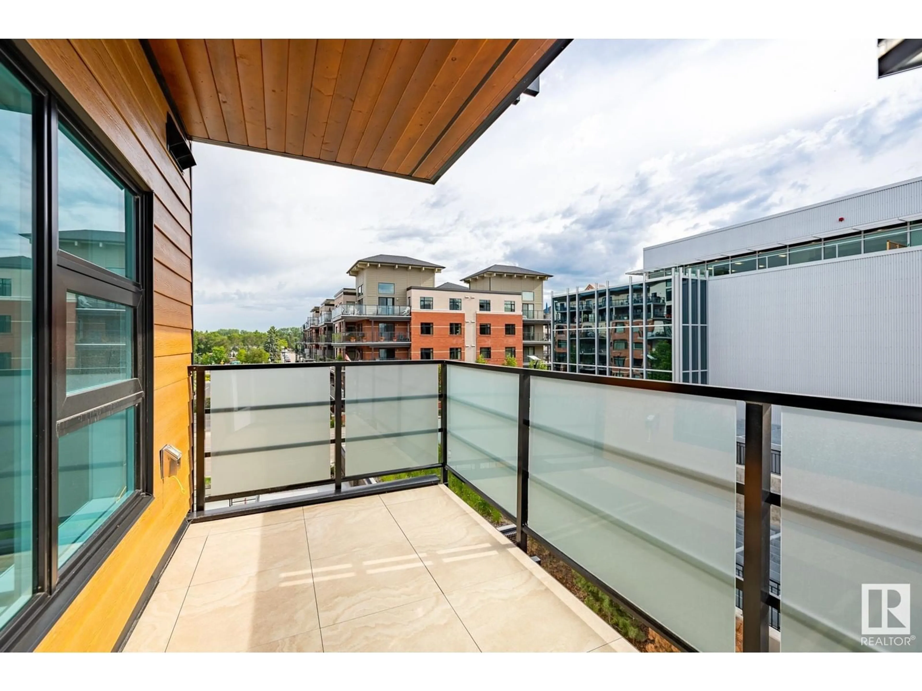 Balcony in the apartment, city buildings view from balcony for #327 61 Festival WY, Sherwood Park Alberta T8A4Y9