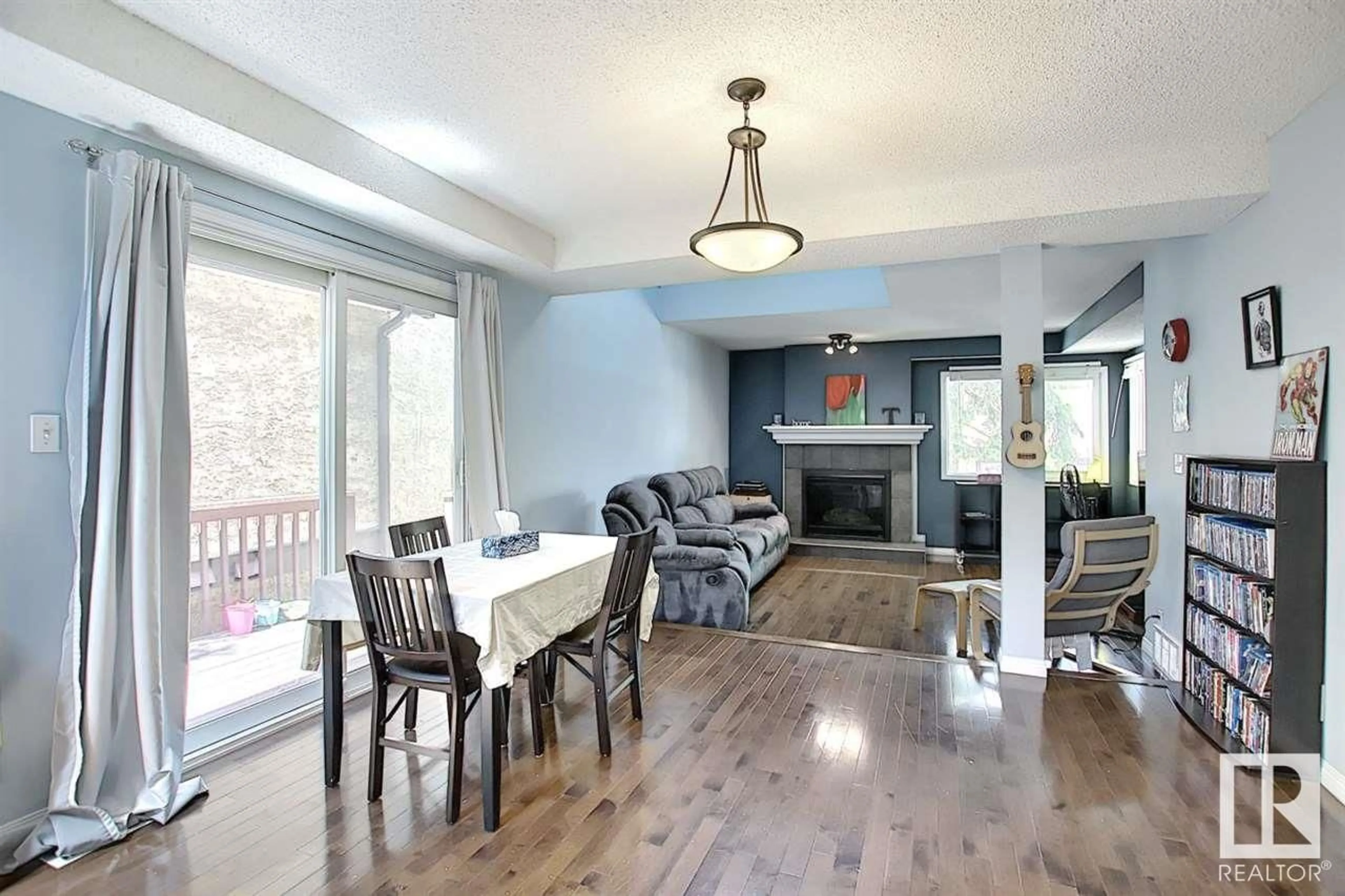 Dining room, wood/laminate floor for 14932 43 AV NW, Edmonton Alberta T6H5S1