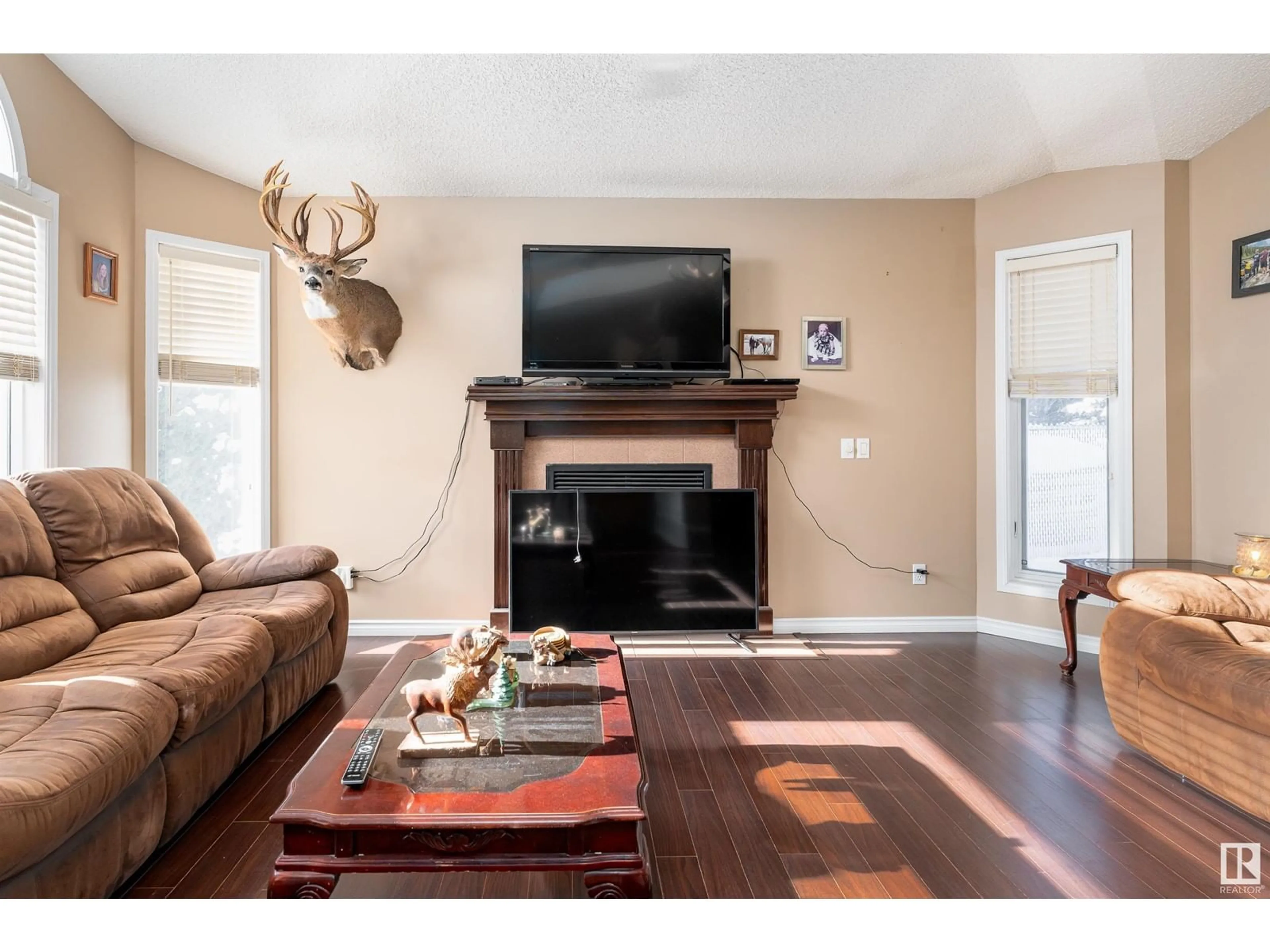 Living room with furniture, wood/laminate floor for 20 LINDSAY CR, Spruce Grove Alberta T7X3W8