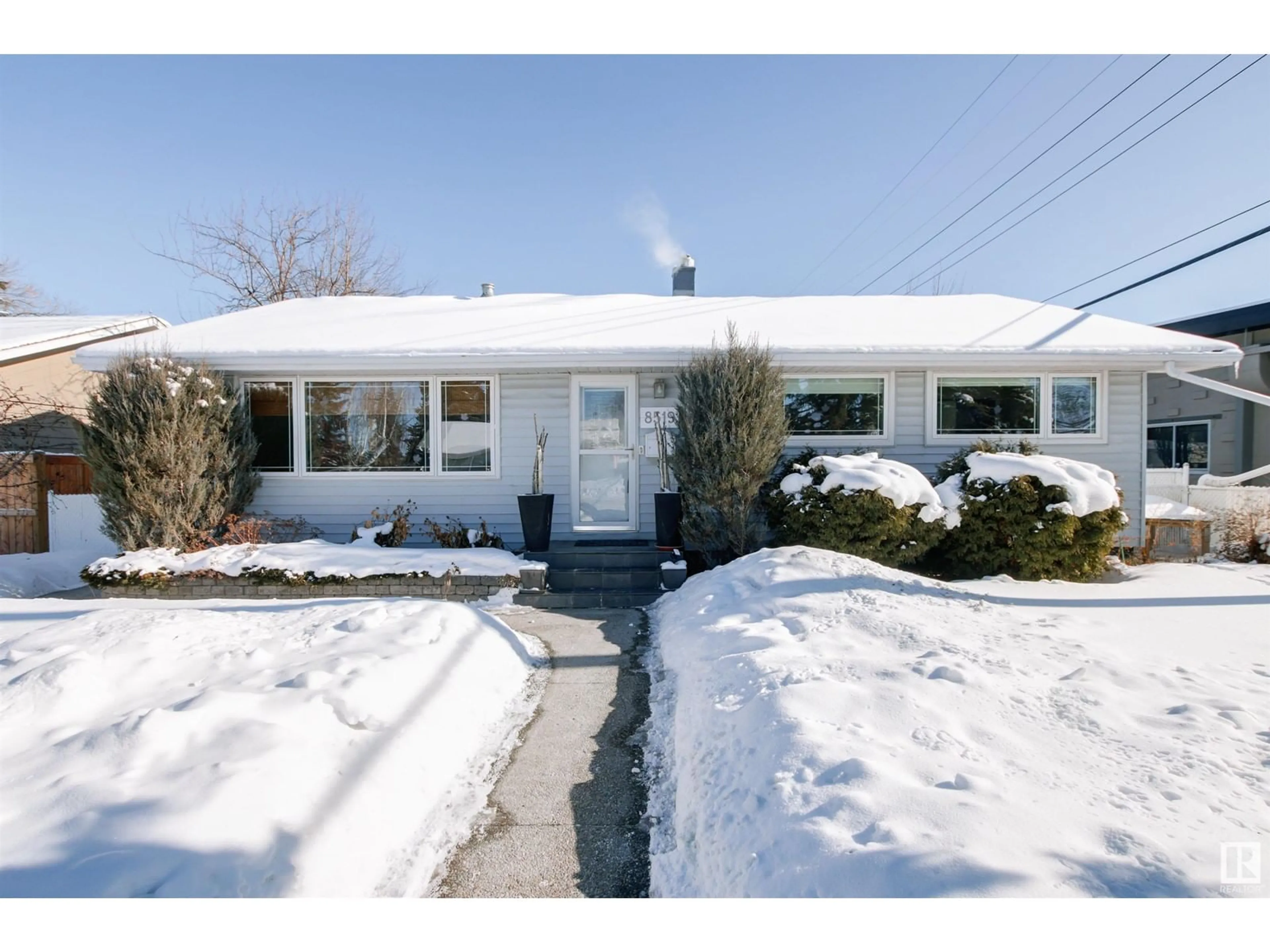 Home with vinyl exterior material, street for 8519 143 ST NW, Edmonton Alberta T5R0N9