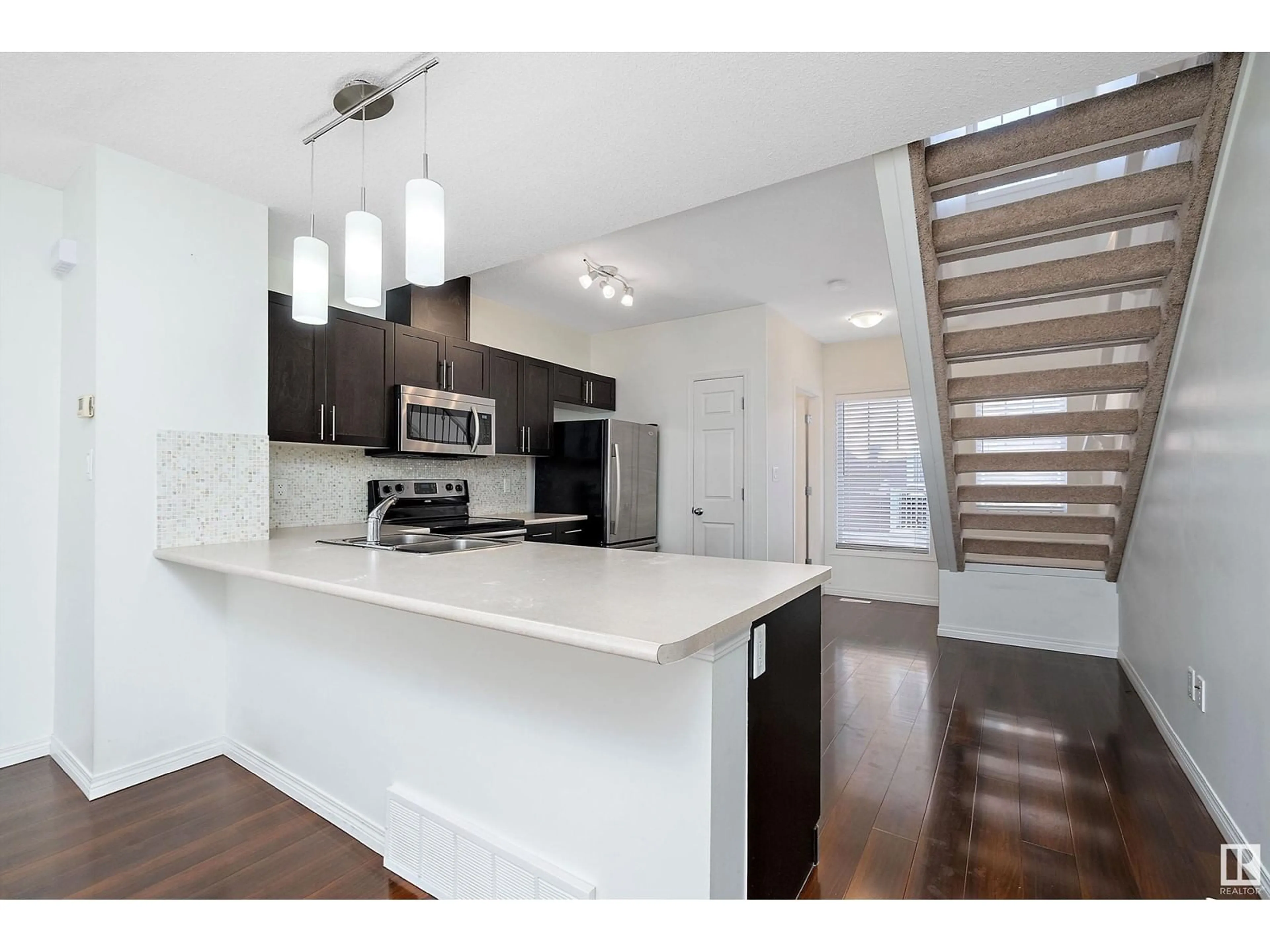 Open concept kitchen, unknown for #84 1623 TOWNE CENTRE BV NW, Edmonton Alberta T6R0S3