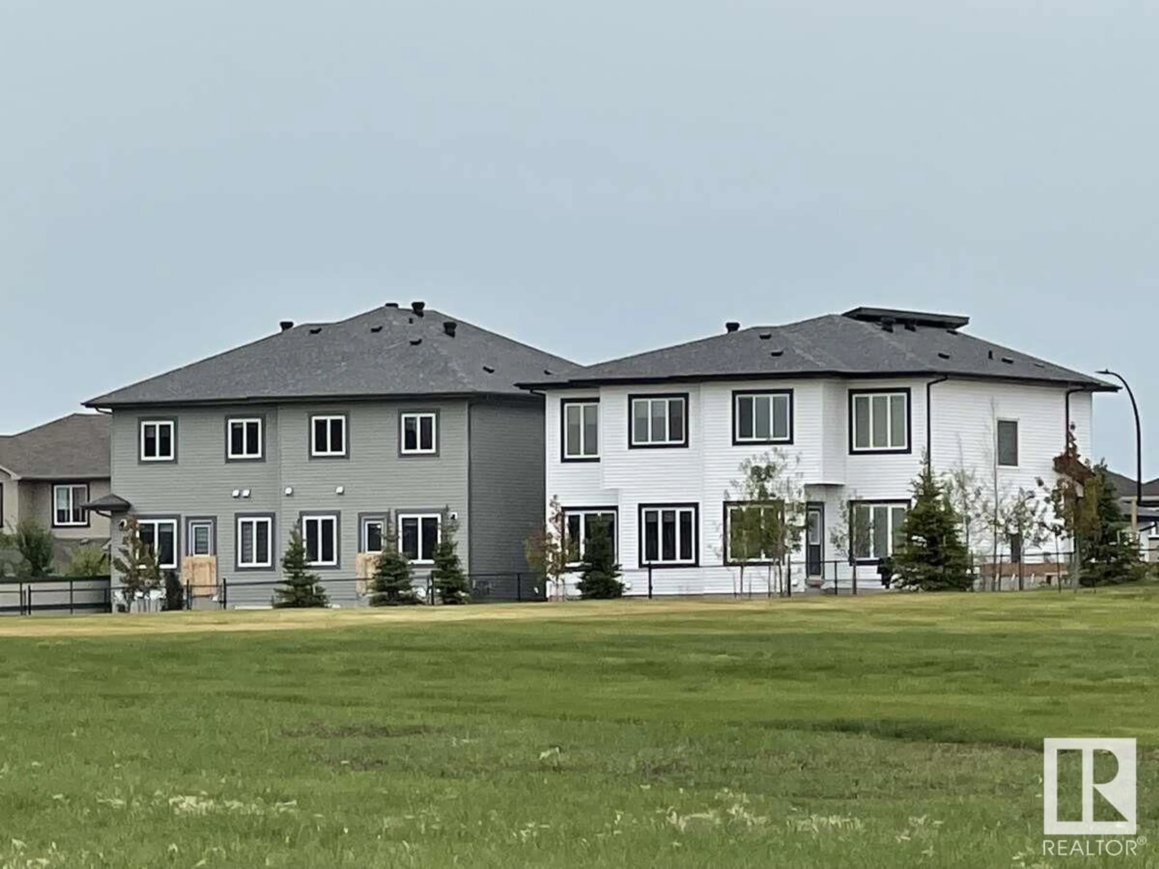 A pic from outside/outdoor area/front of a property/back of a property/a pic from drone, building for 94 ELM ST, Fort Saskatchewan Alberta T8L0X8