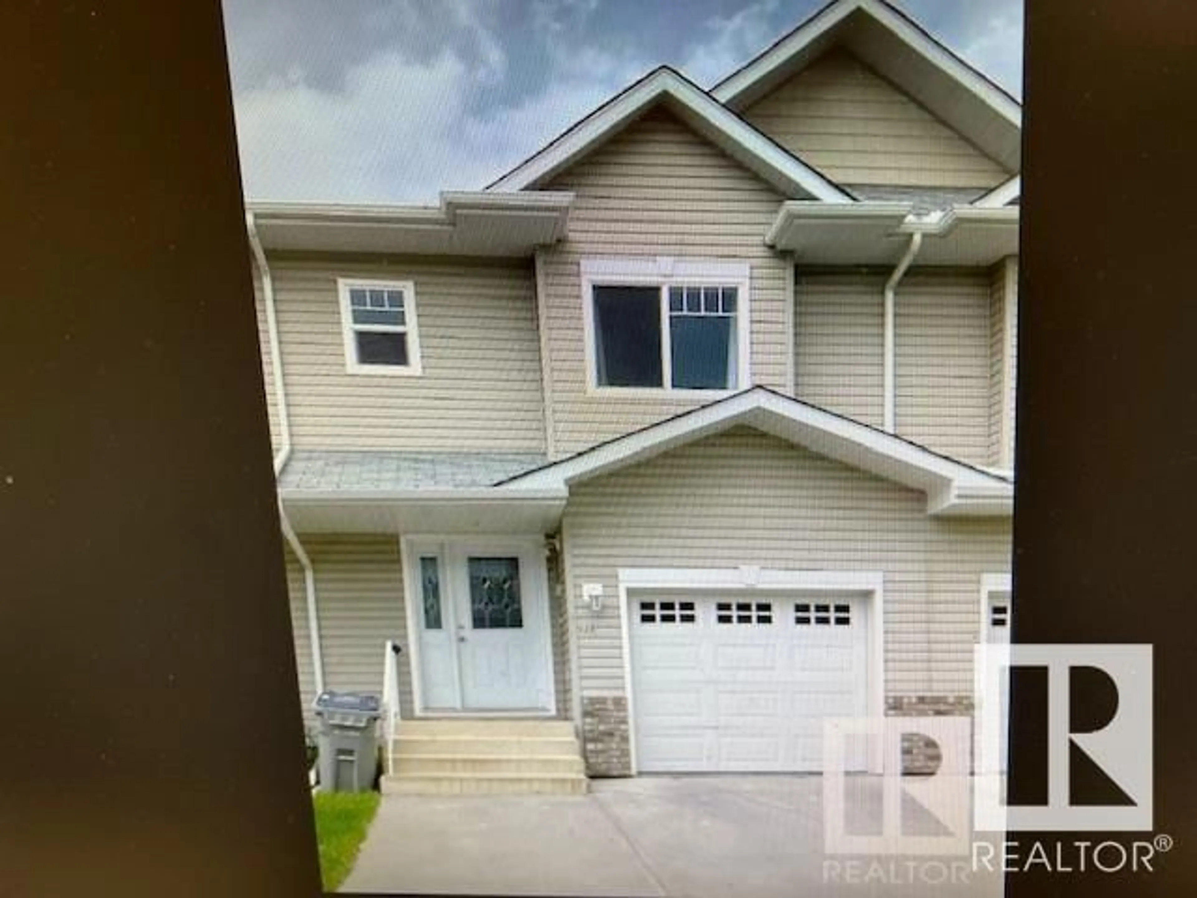 Home with vinyl exterior material, street for #115 5001 62 ST, Beaumont Alberta T4X0C7