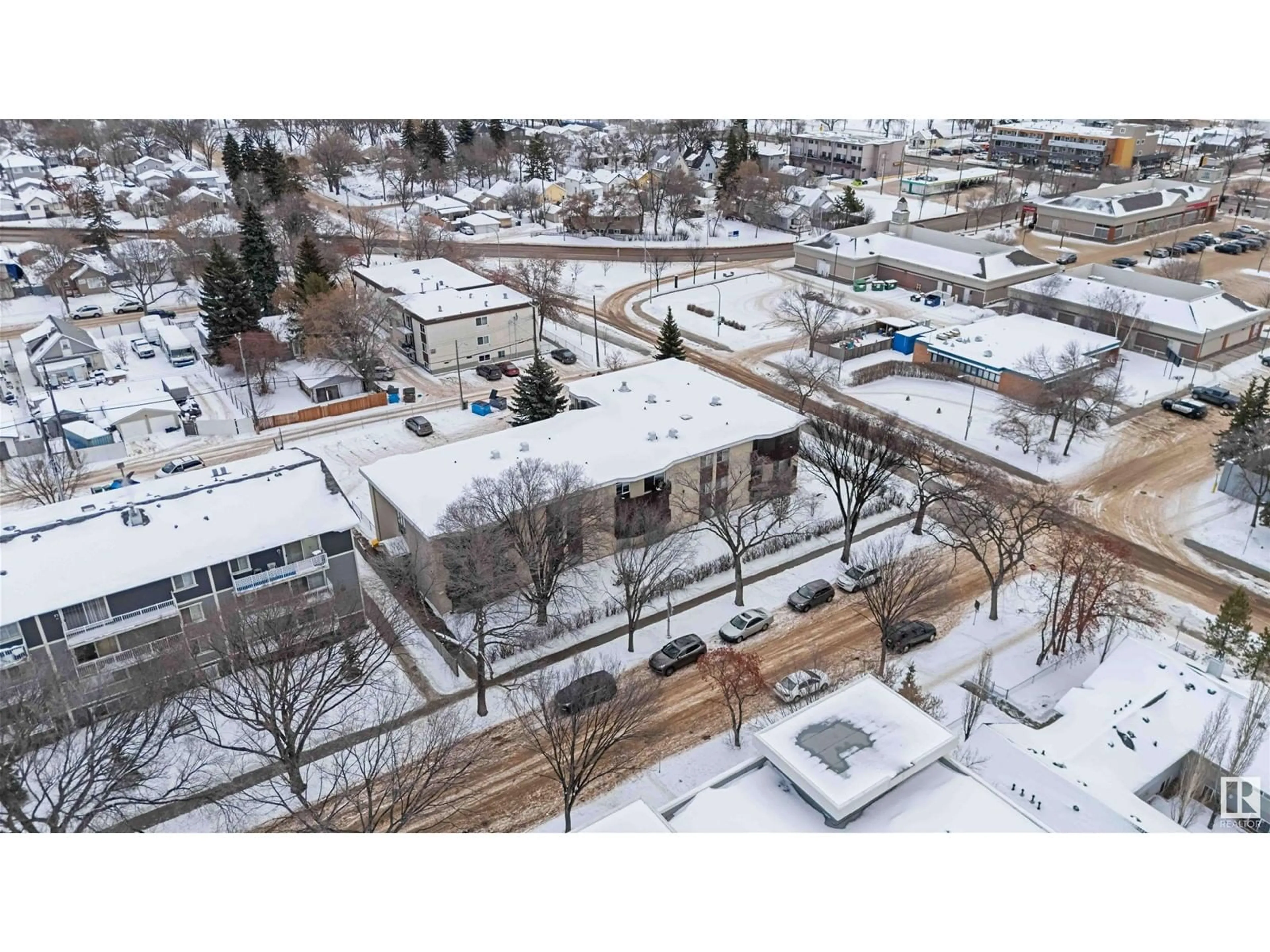 A pic from outside/outdoor area/front of a property/back of a property/a pic from drone, street for #202 - 11907 81 ST, Edmonton Alberta T5B2S7