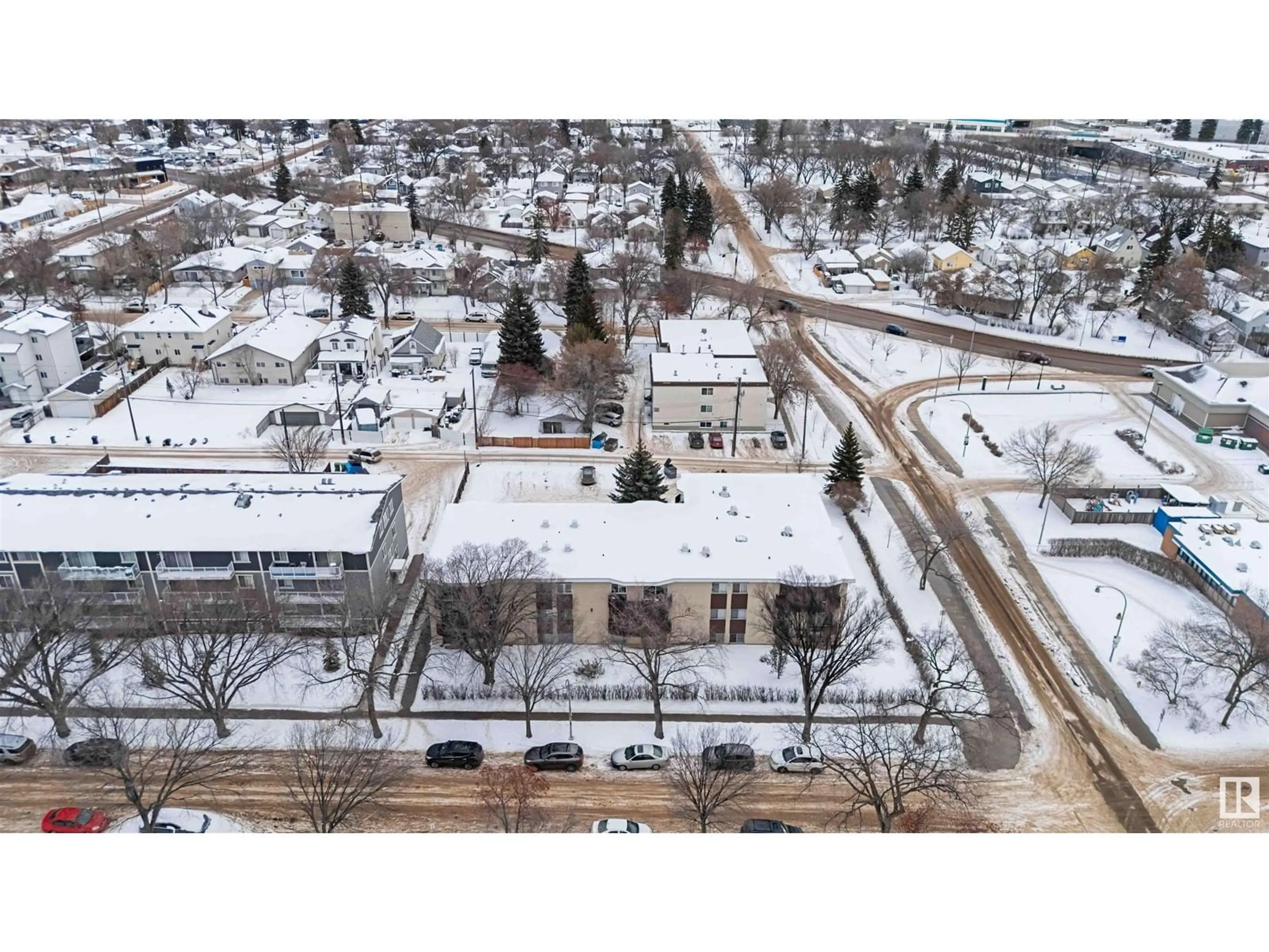 A pic from outside/outdoor area/front of a property/back of a property/a pic from drone, street for #202 - 11907 81 ST, Edmonton Alberta T5B2S7