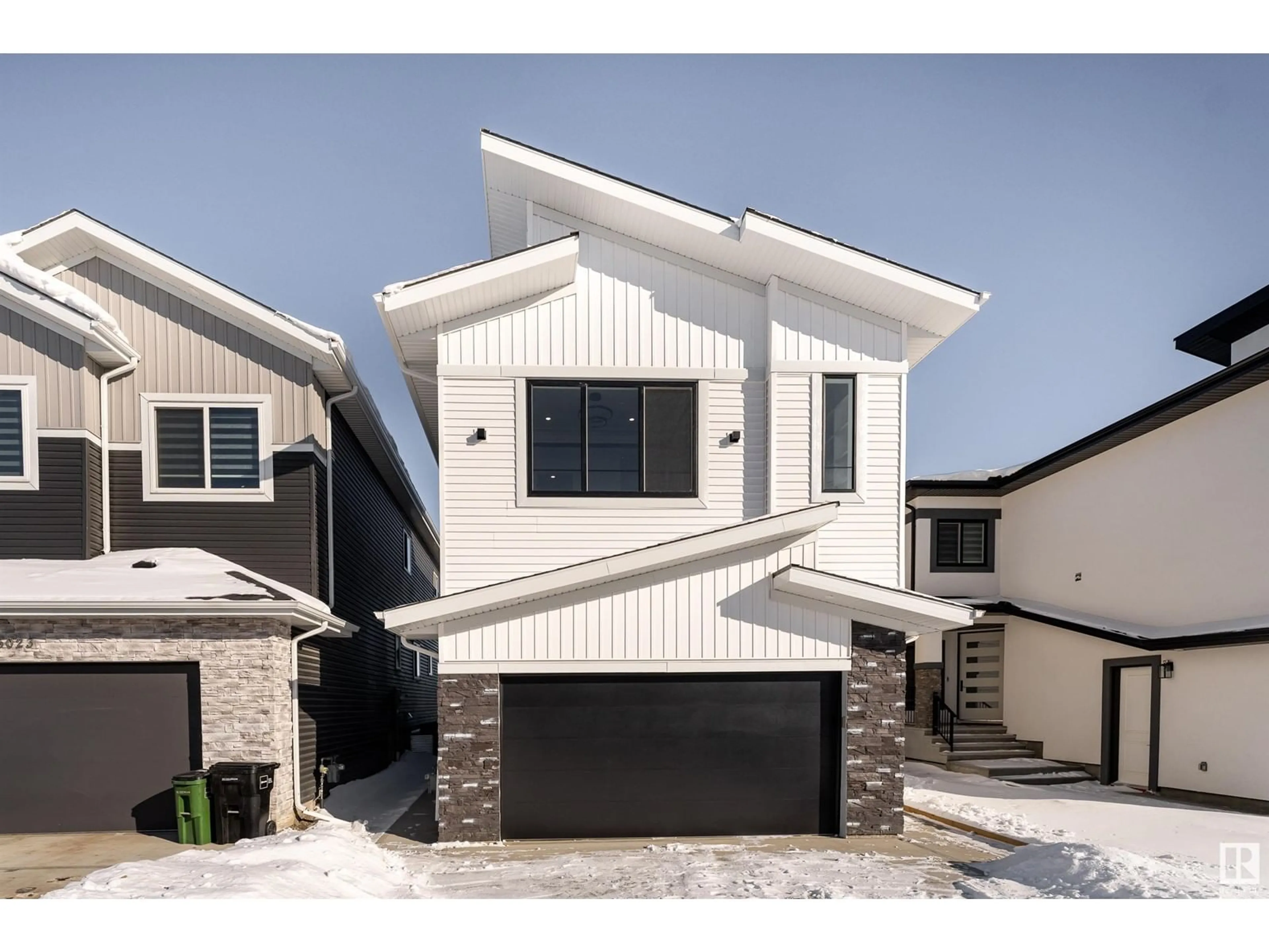 Home with vinyl exterior material, street for 15019 10 ST NW, Edmonton Alberta T5Y4C8