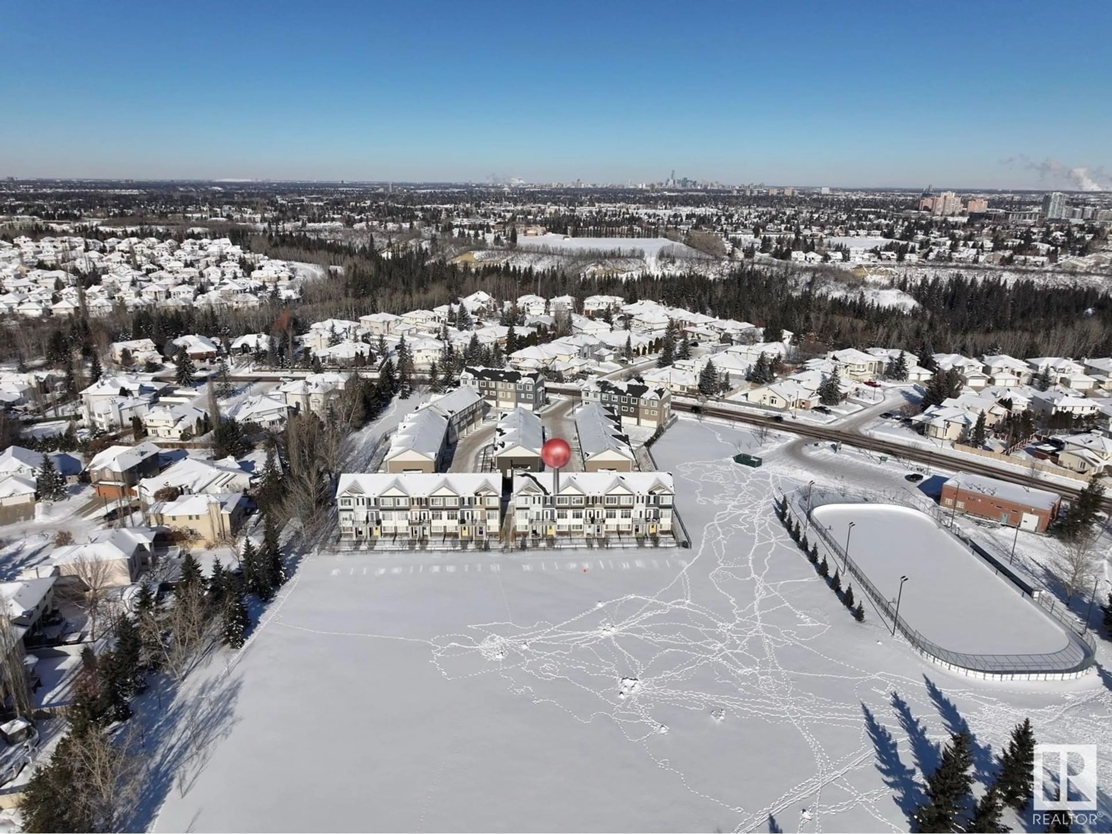 A pic from outside/outdoor area/front of a property/back of a property/a pic from drone, unknown for #12 11373 12 AV NW, Edmonton Alberta T6J5V2