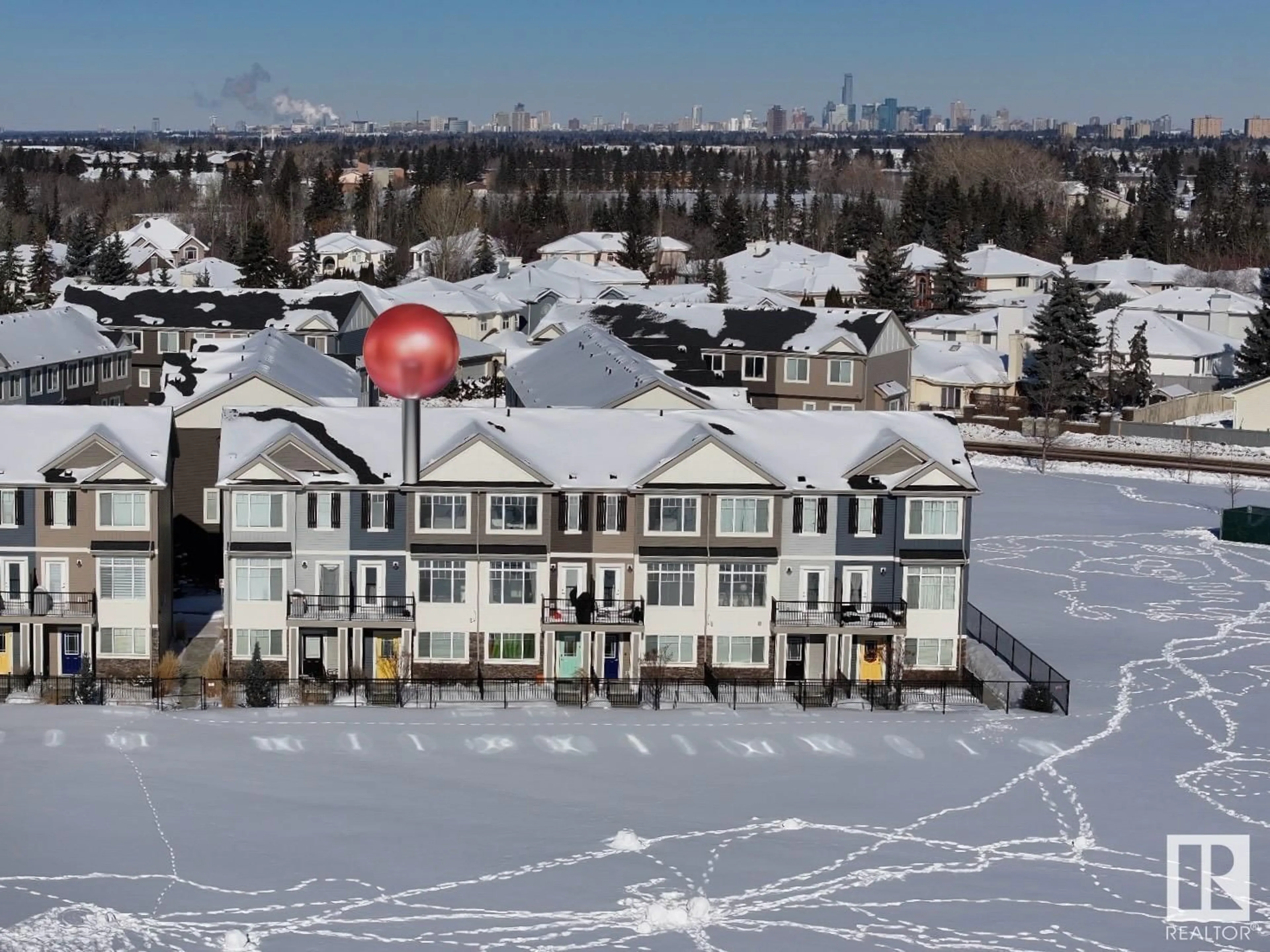 A pic from outside/outdoor area/front of a property/back of a property/a pic from drone, unknown for #12 11373 12 AV NW, Edmonton Alberta T6J5V2