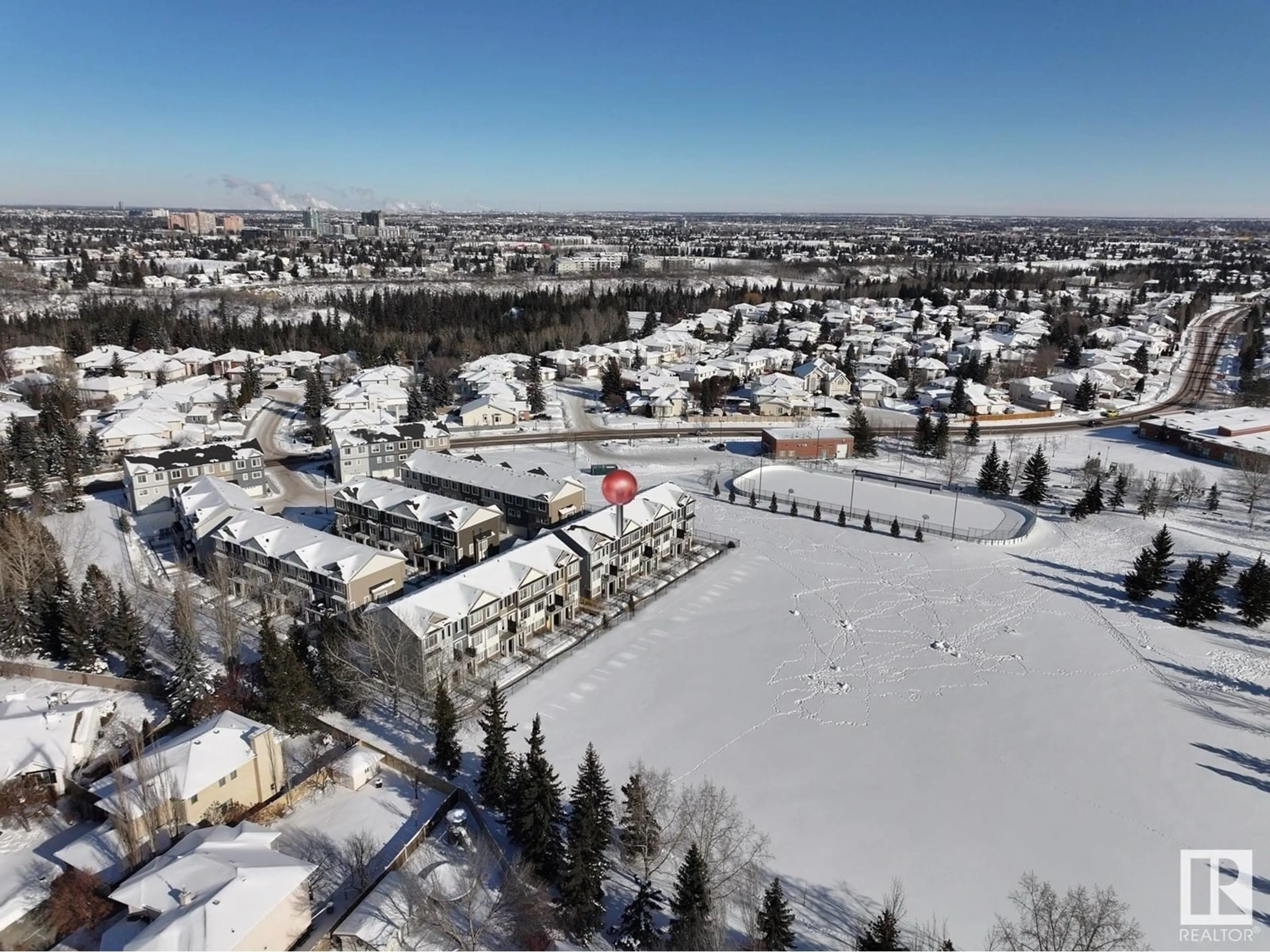 A pic from outside/outdoor area/front of a property/back of a property/a pic from drone, mountain view for #12 11373 12 AV NW, Edmonton Alberta T6J5V2