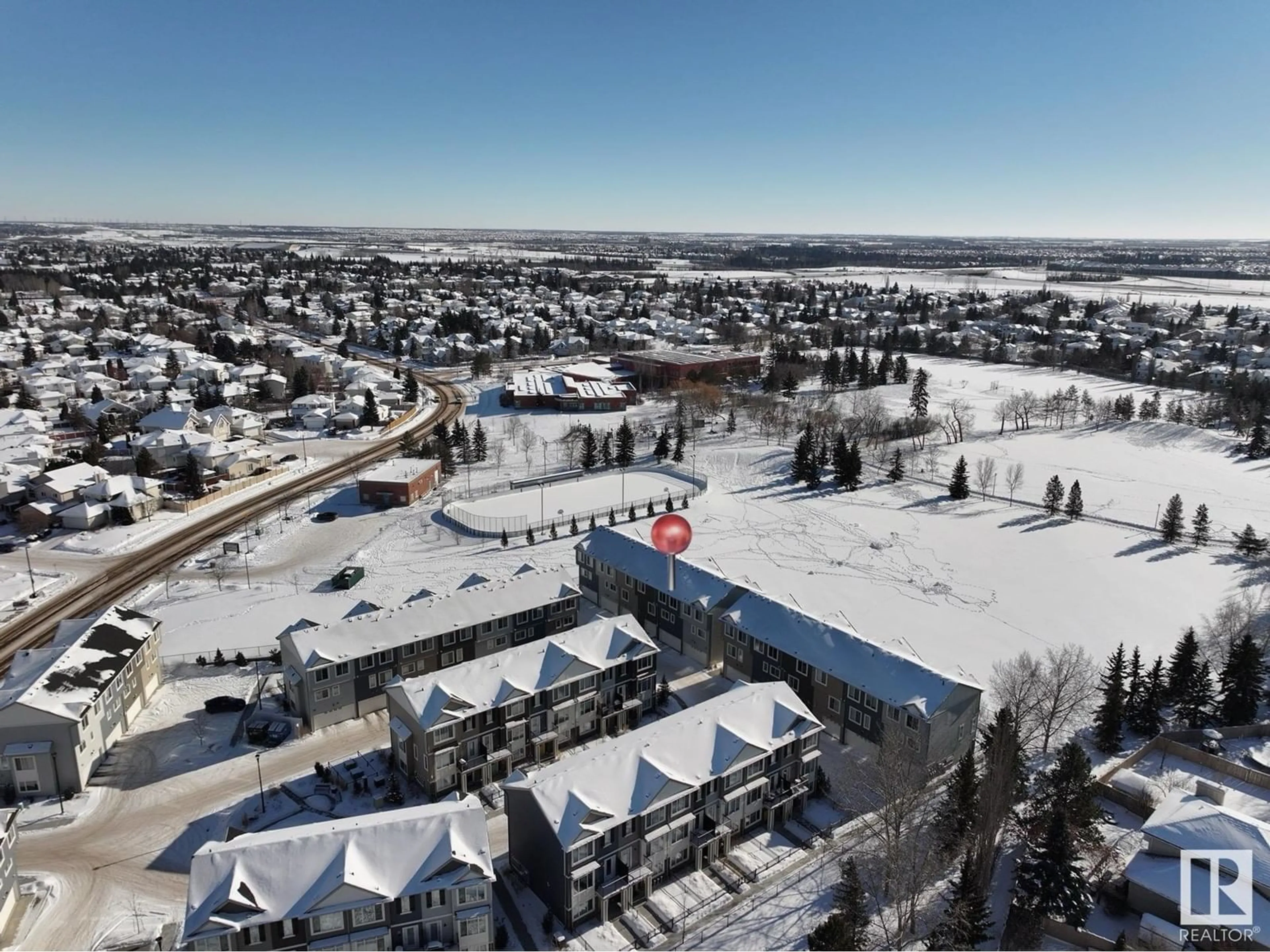 A pic from outside/outdoor area/front of a property/back of a property/a pic from drone, mountain view for #12 11373 12 AV NW, Edmonton Alberta T6J5V2