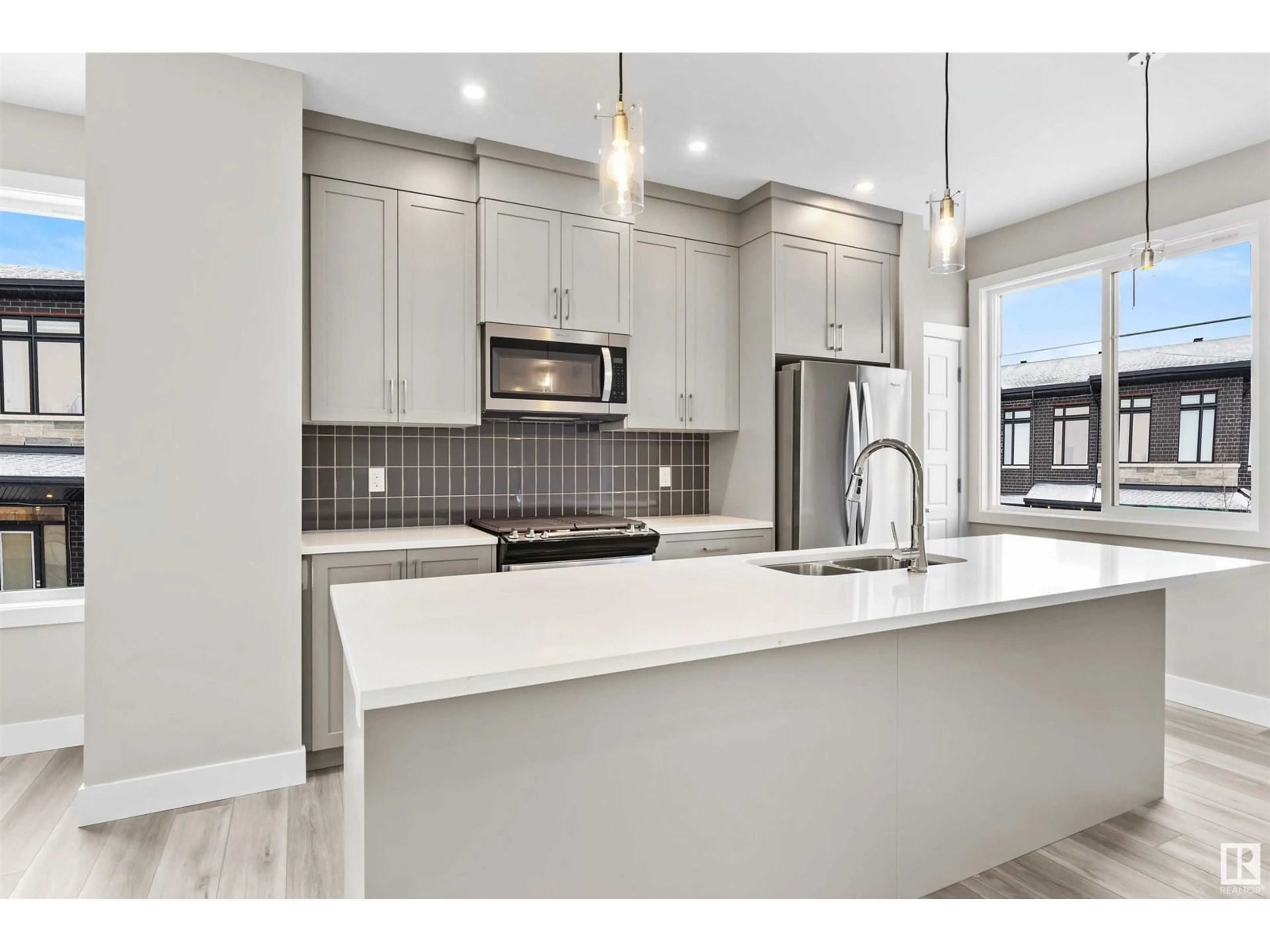 Open concept kitchen, unknown for #63 6905 25 AV SW, Edmonton Alberta T6X3B7