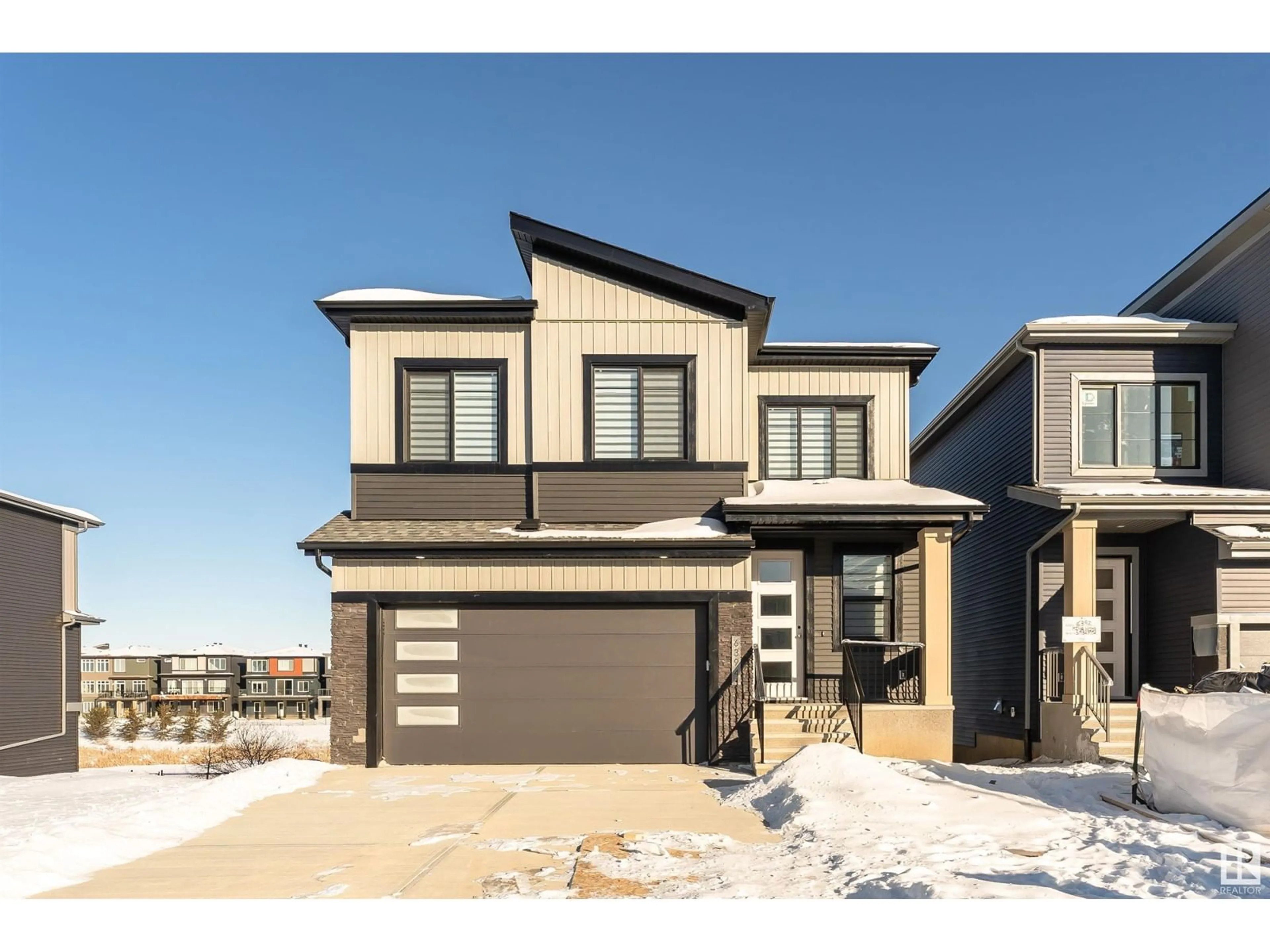 Home with brick exterior material, street for 6394 KING WD SW SW, Edmonton Alberta T6W5J3