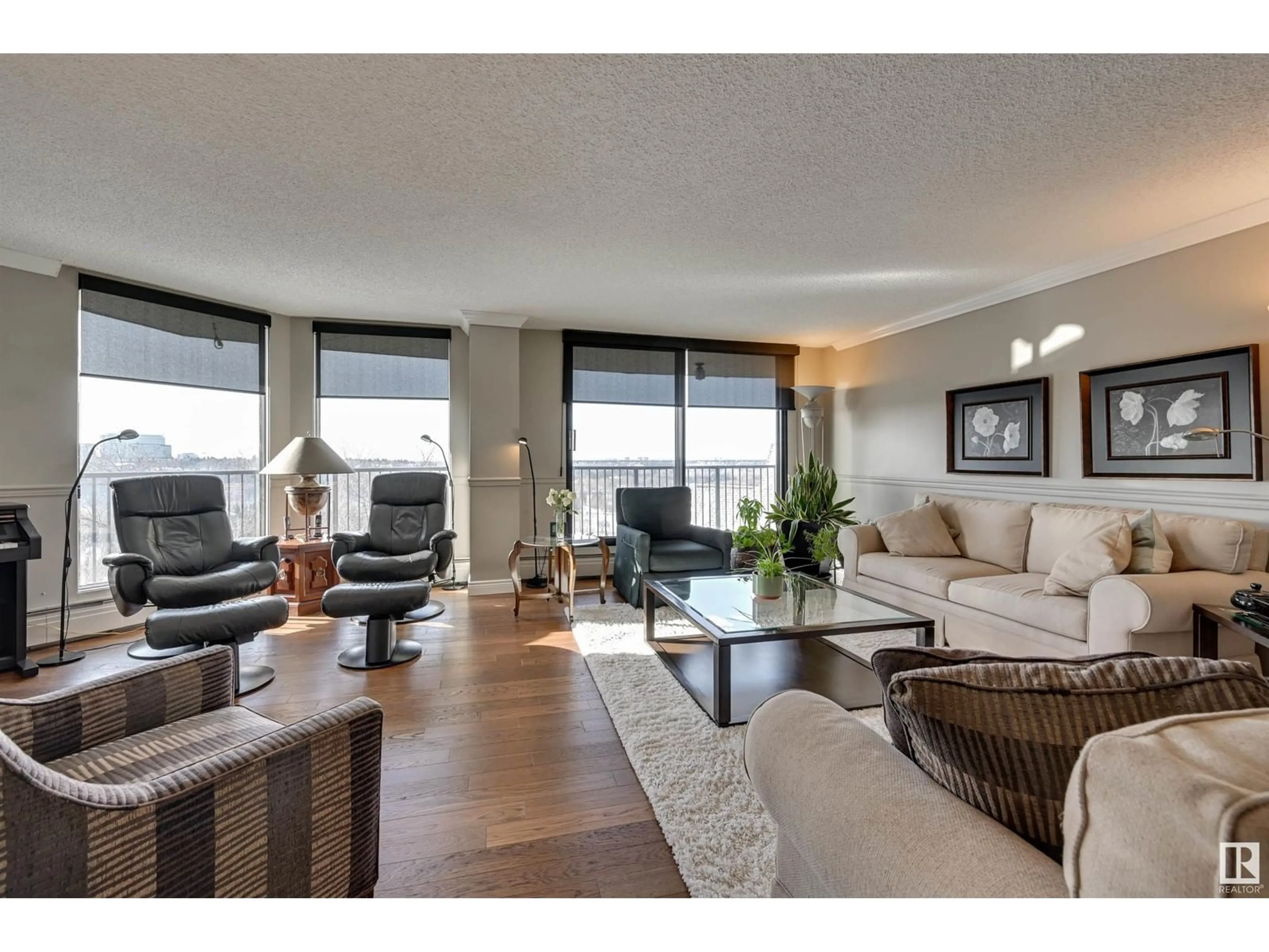 Living room with furniture, wood/laminate floor for #703 11710 100 AV NW, Edmonton Alberta T5K2G3