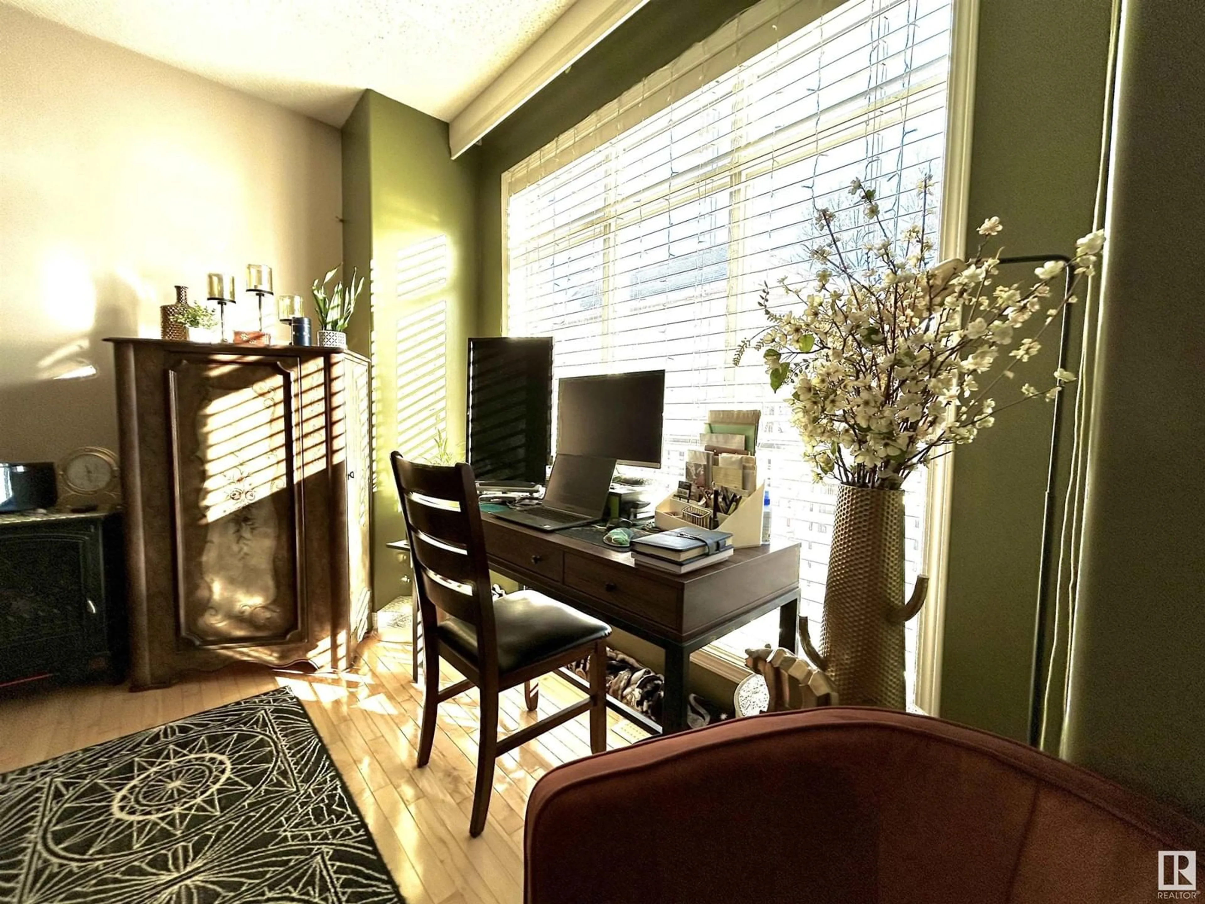 Dining room, wood/laminate floor for #53 8403 164 AV NW, Edmonton Alberta T5Z3Y2