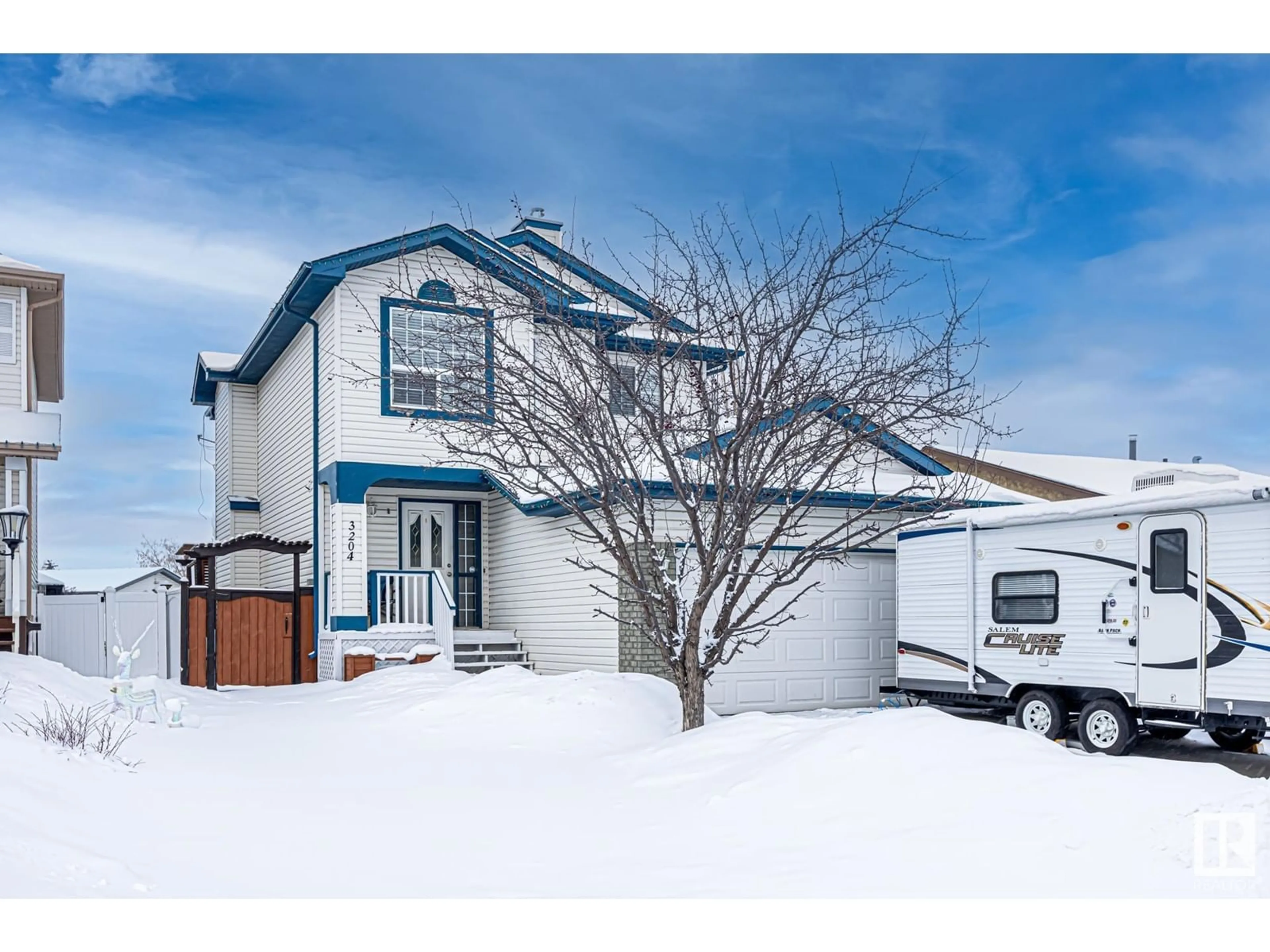 Home with vinyl exterior material, street for 3204 42 ST, Leduc Alberta T9E6B8