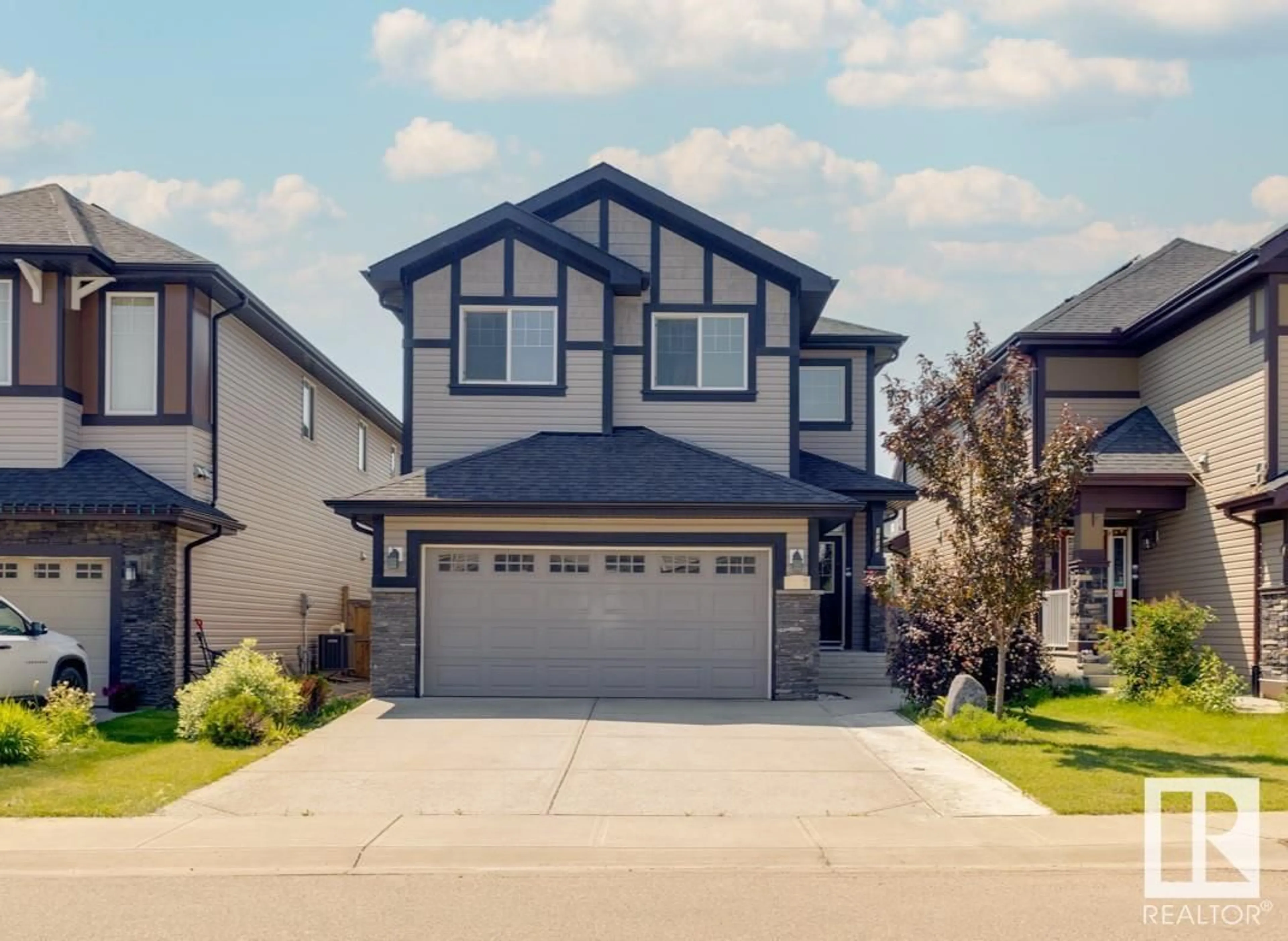 Home with vinyl exterior material, street for 3257 ABBOTT CR SW, Edmonton Alberta T6W2M4