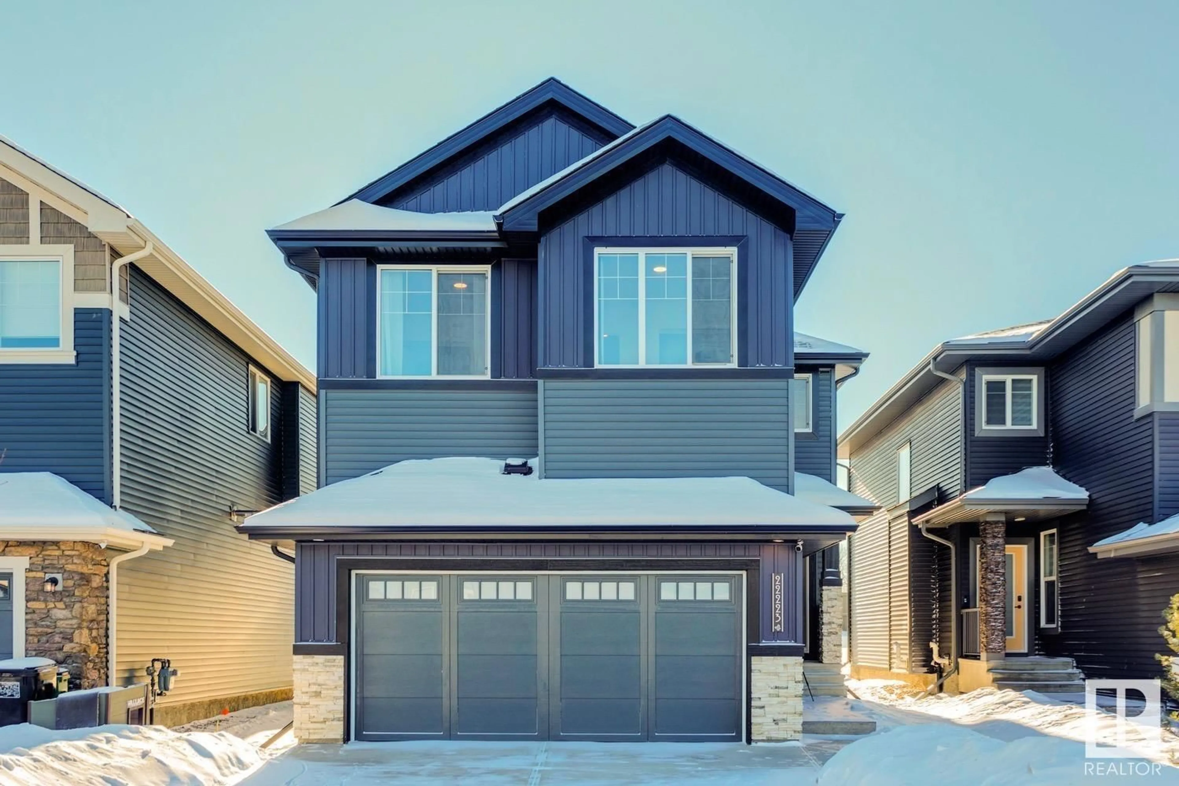 Home with vinyl exterior material, street for 22223 80 AV NW, Edmonton Alberta T5T7H9