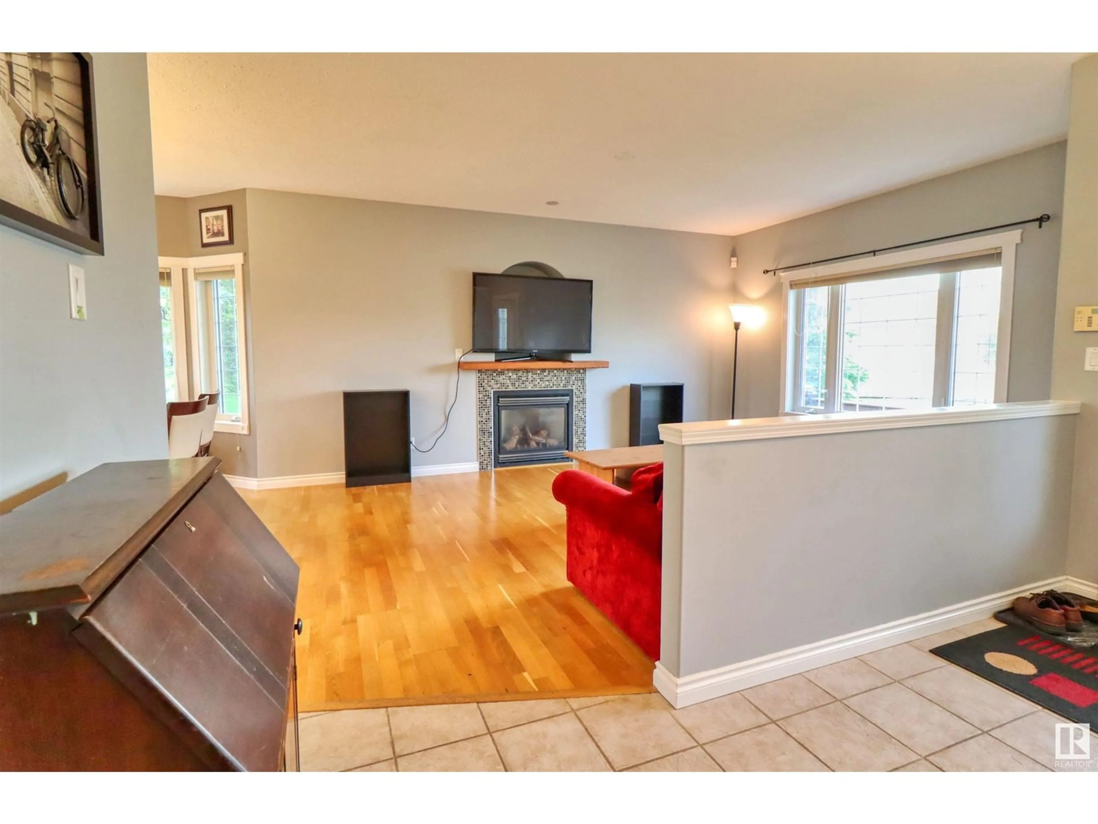 Living room with furniture, wood/laminate floor for 5209 DRAKE DR, Cold Lake Alberta T9M1N9
