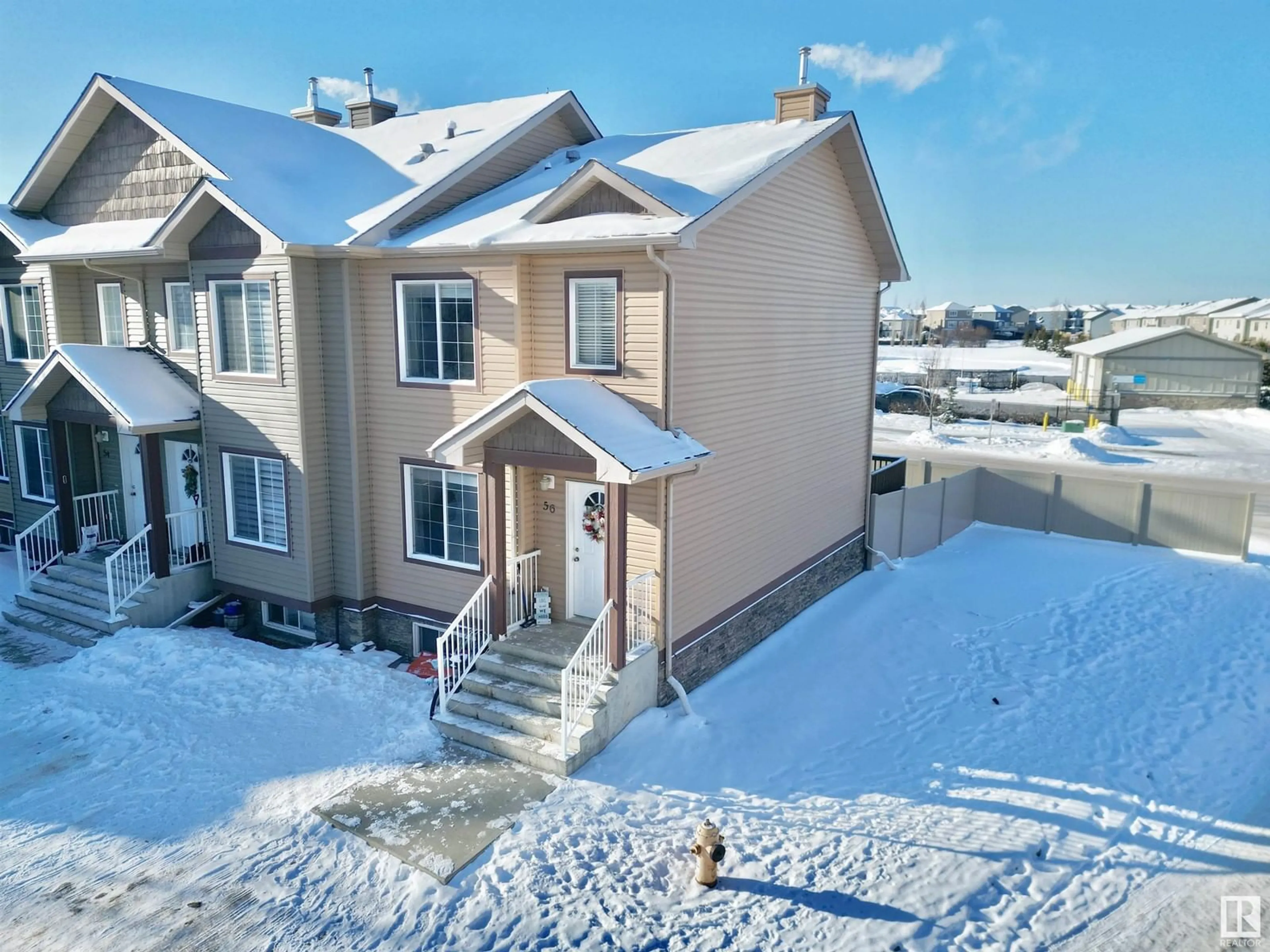 A pic from outside/outdoor area/front of a property/back of a property/a pic from drone, unknown for #56 320 SPRUCE RIDGE RD, Spruce Grove Alberta T7X0H5