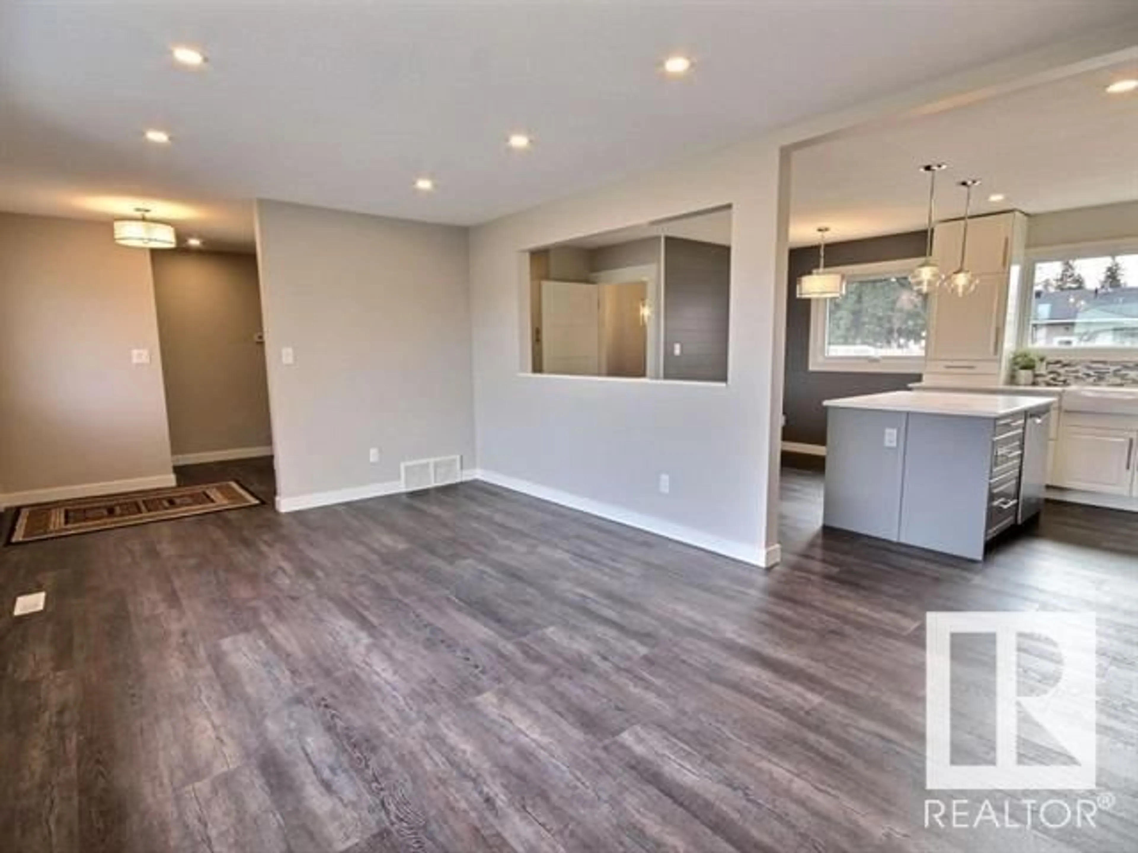 Open concept kitchen, wood/laminate floor for 15921 93A AV NW, Edmonton Alberta T5R5J5