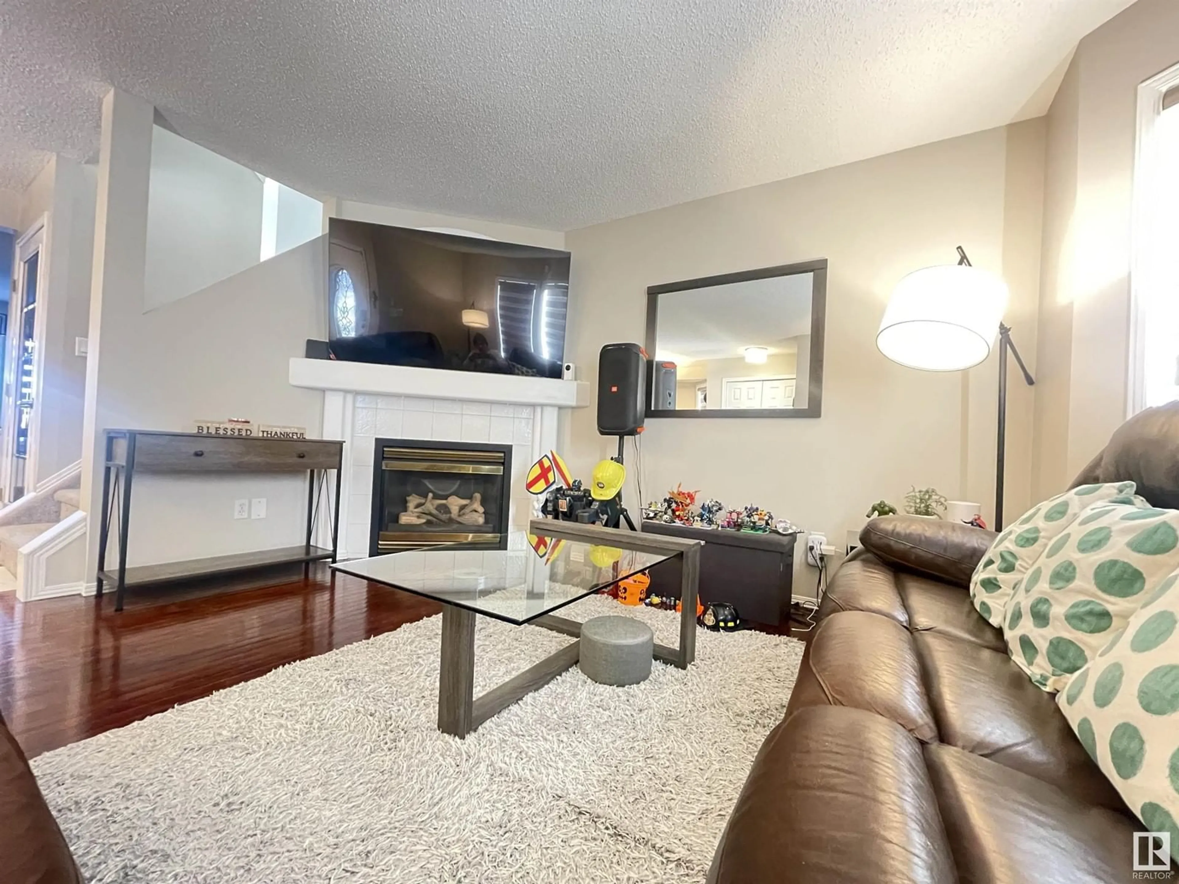 Living room with furniture, unknown for 4512 149 AV NW, Edmonton Alberta T5Y2Z1