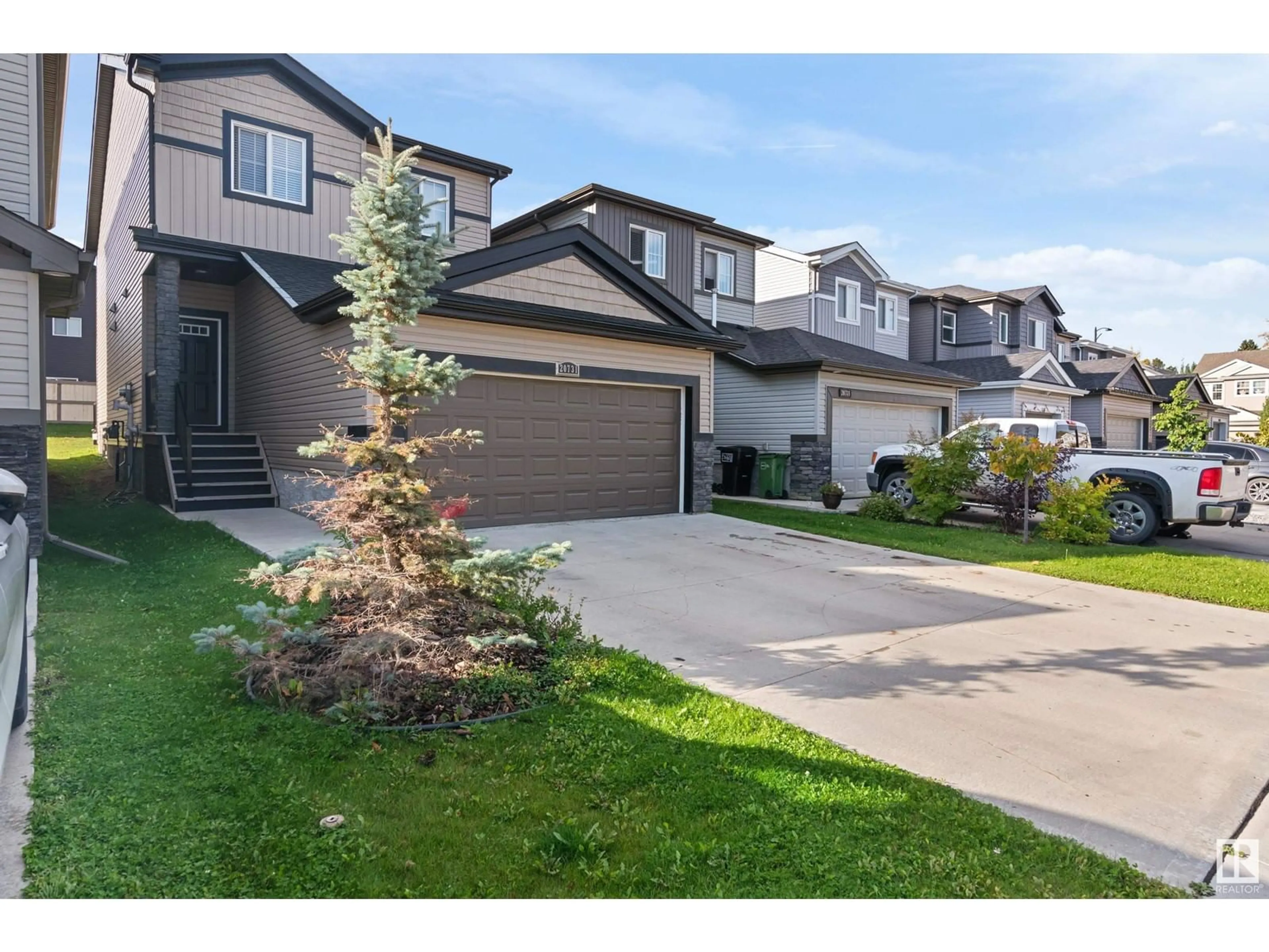 A pic from outside/outdoor area/front of a property/back of a property/a pic from drone, street for 20731 99 AV NW NW, Edmonton Alberta T5T7G3