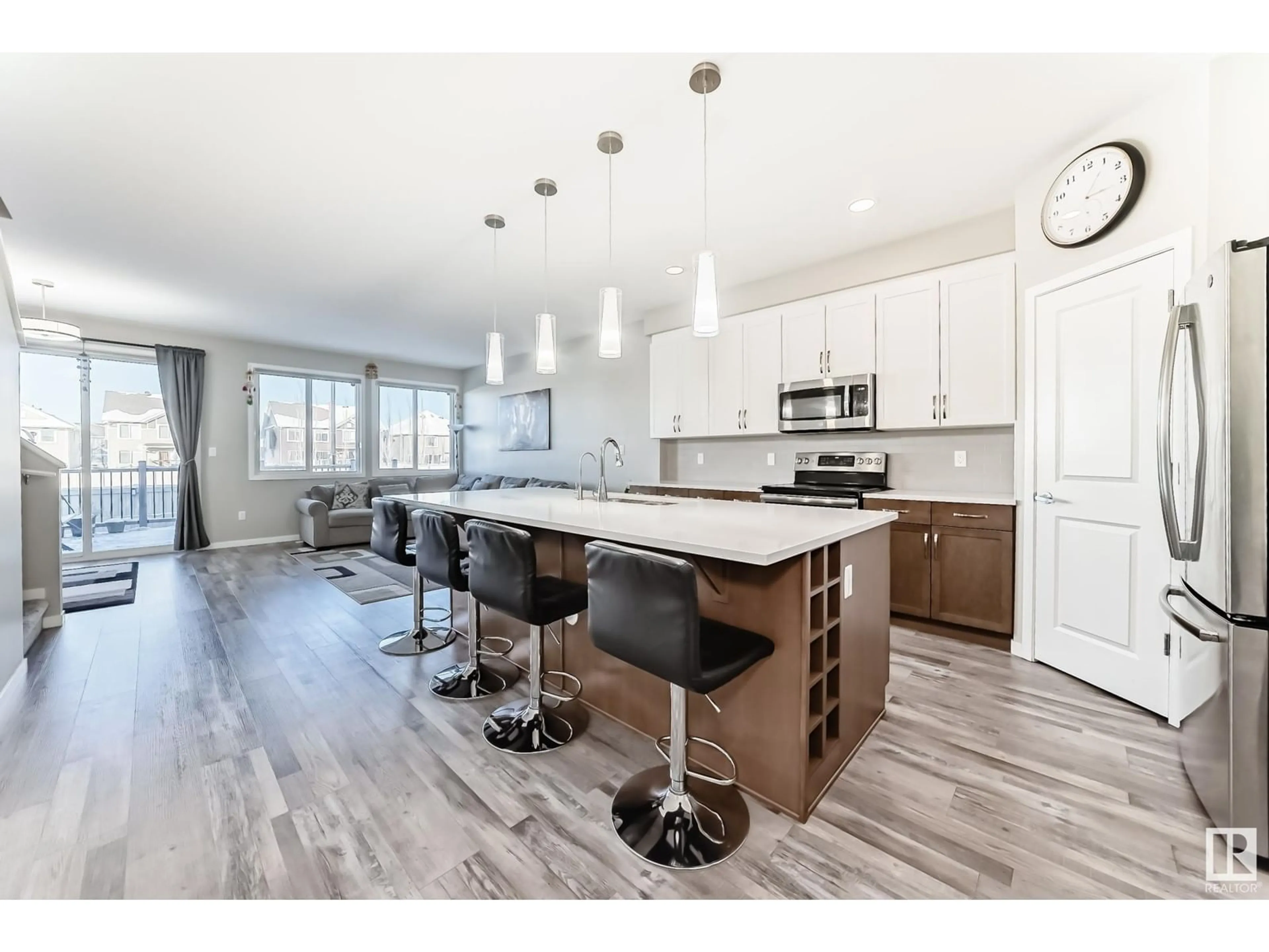 Open concept kitchen, wood/laminate floor for 2751 Chokecherry PL SW SW, Edmonton Alberta T6X2K1