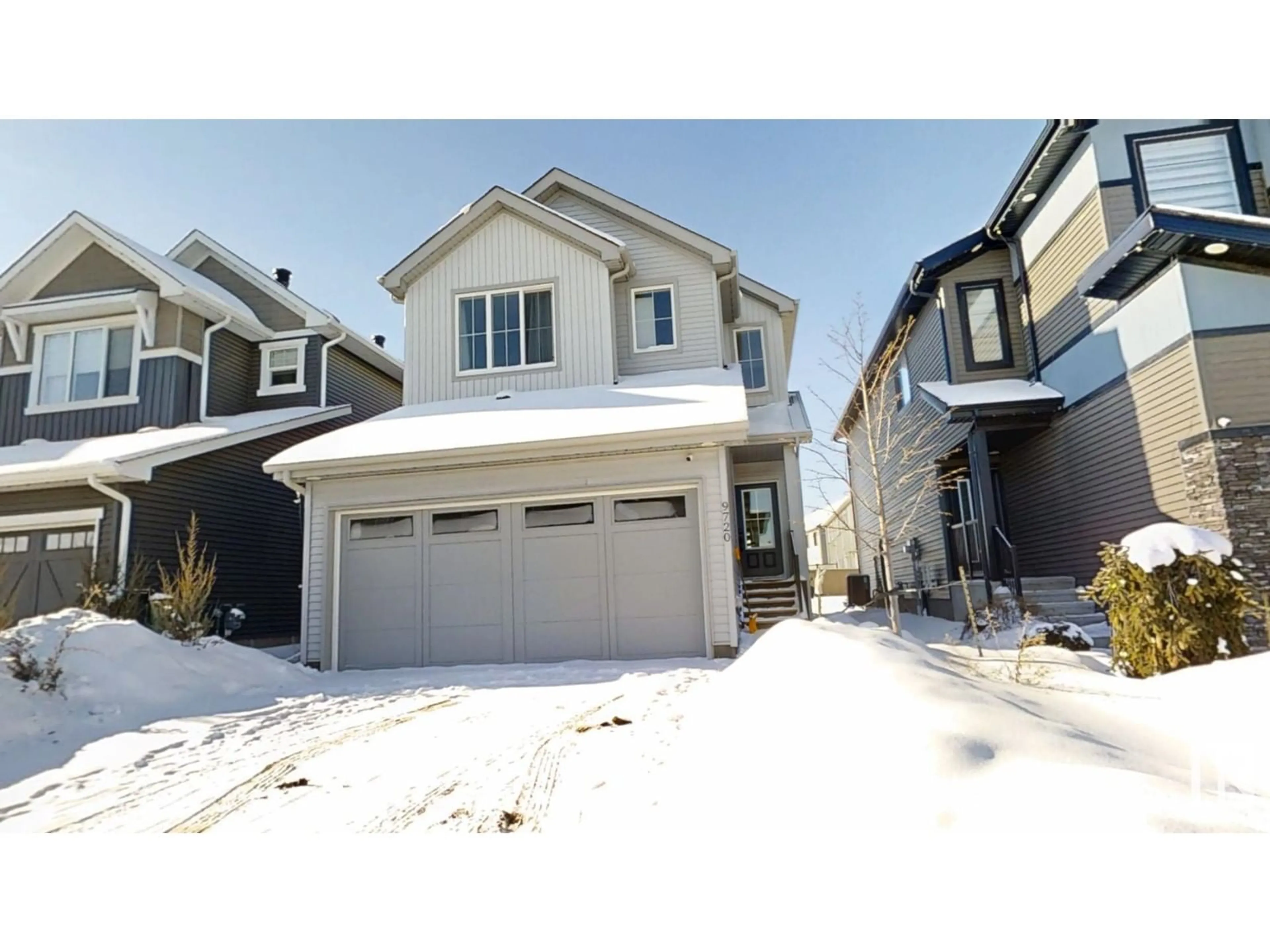 Home with vinyl exterior material, street for 9720 224 ST NW, Edmonton Alberta T5T1N1