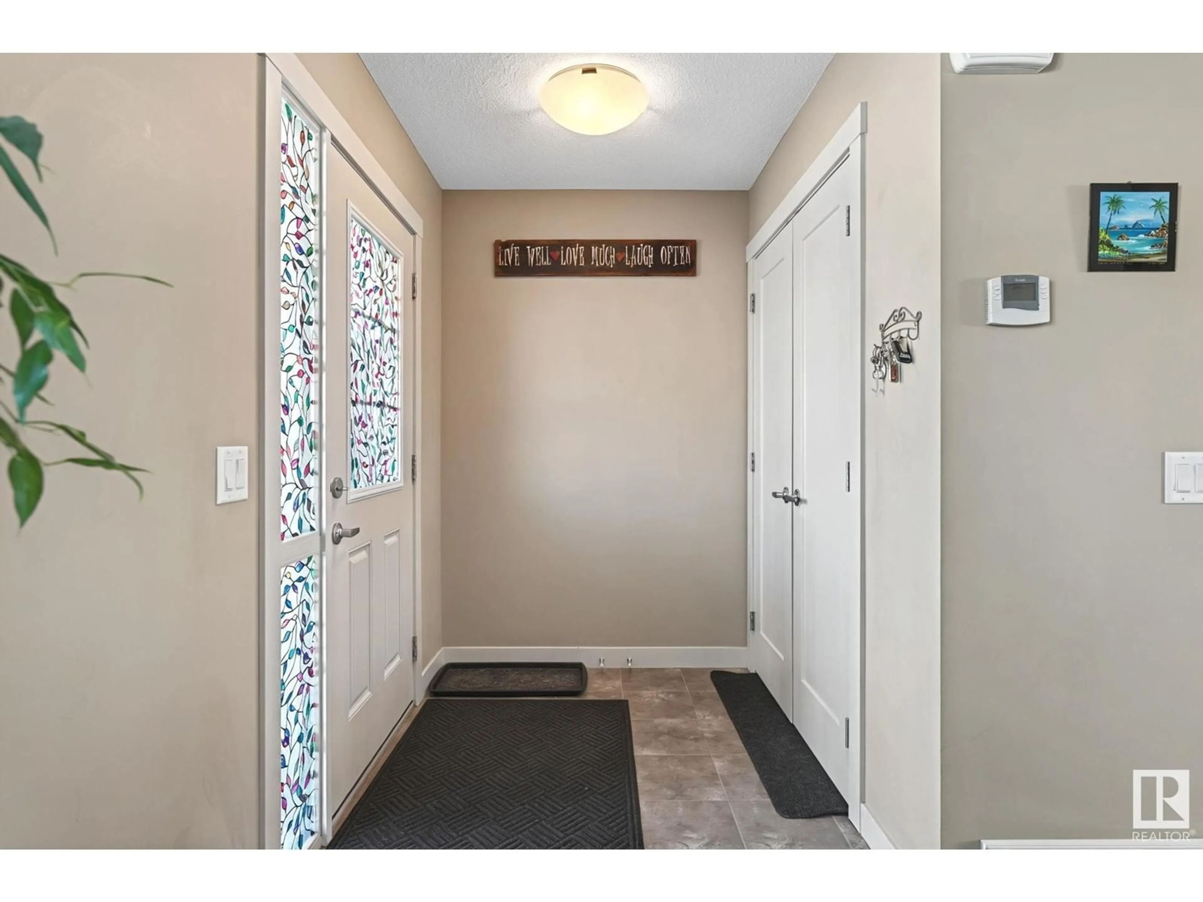 Indoor entryway for 17076 38 ST NW, Edmonton Alberta T5Y3R8