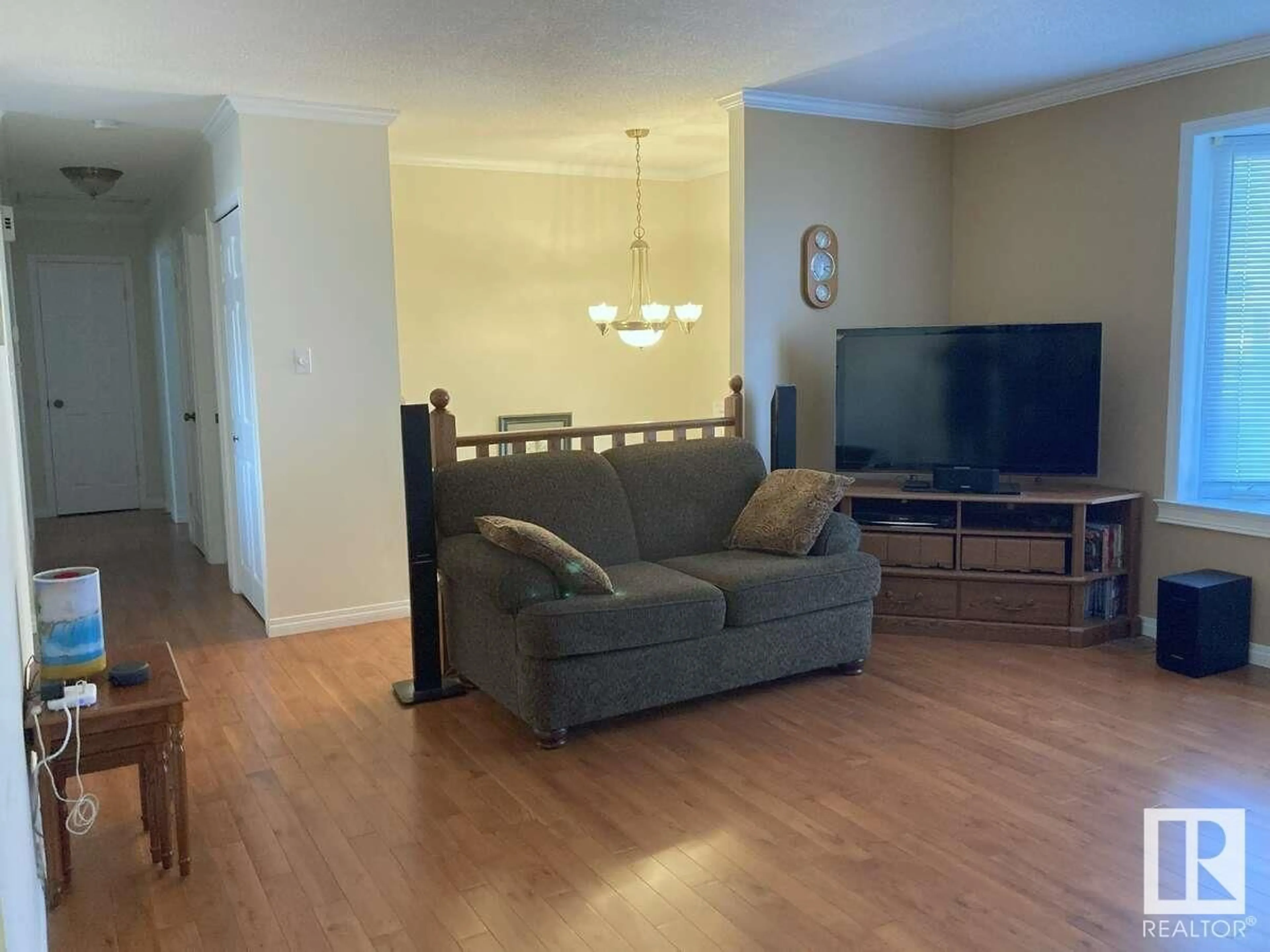 Living room with furniture, wood/laminate floor for 4306 40 AV, Stony Plain Alberta T7Z1J7