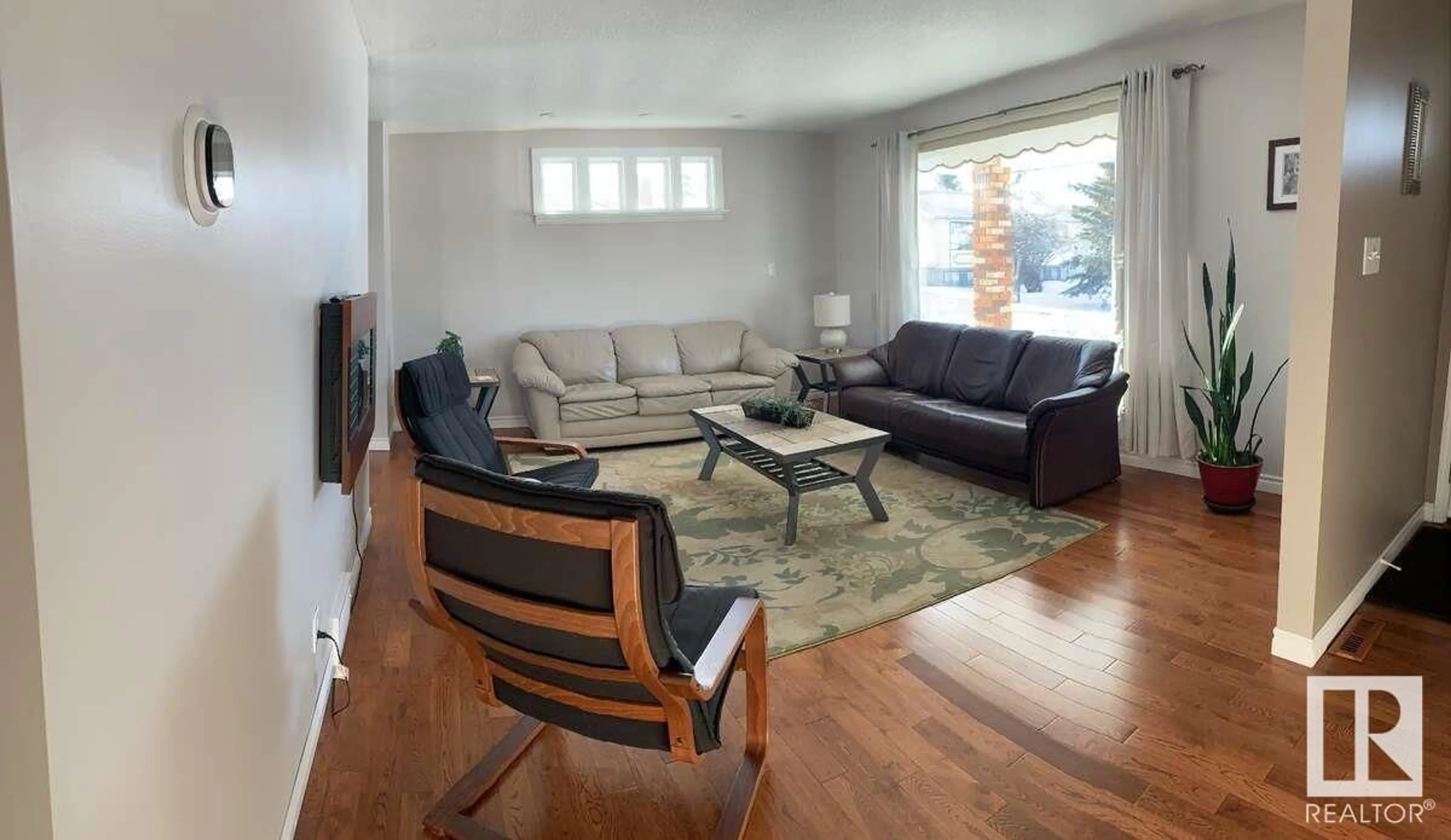 Living room with furniture, wood/laminate floor for 30 BELMONT CR, Spruce Grove Alberta T7X2H2