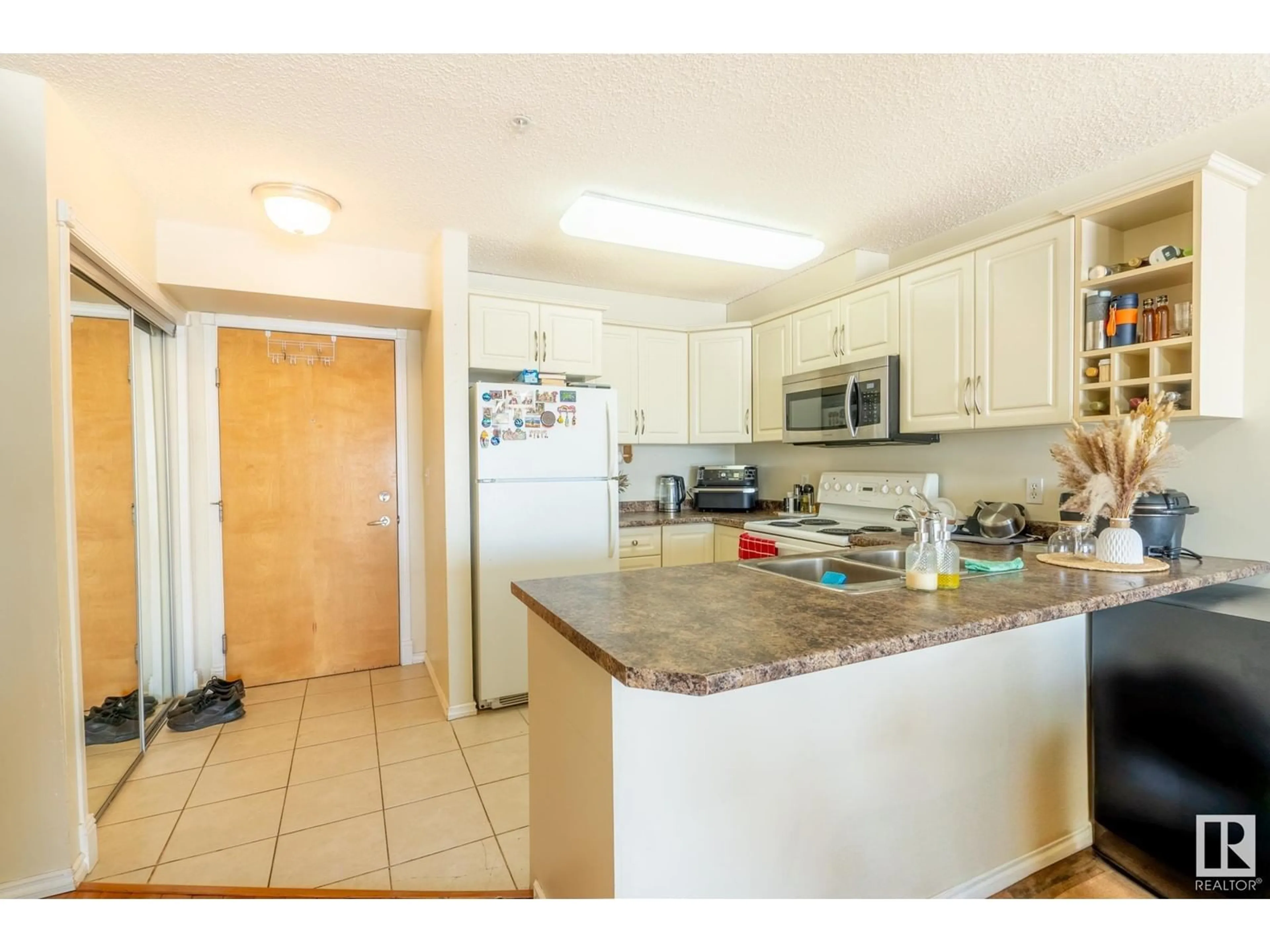 Standard kitchen, ceramic/tile floor for #316 17404 64 AV NW NW, Edmonton Alberta T5T6Y4