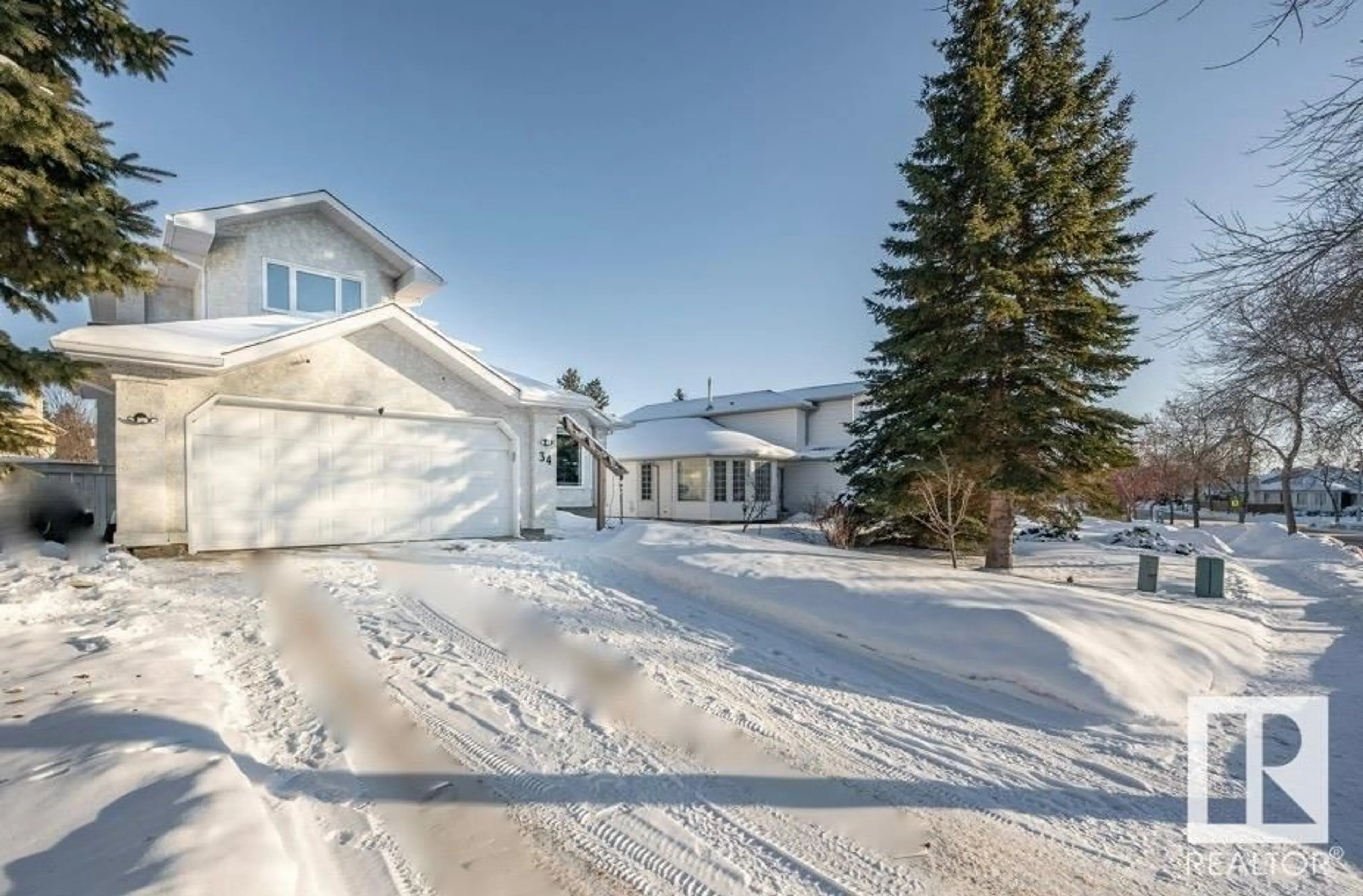 A pic from outside/outdoor area/front of a property/back of a property/a pic from drone, street for 34 HARWOOD DR, St. Albert Alberta T8N5P8