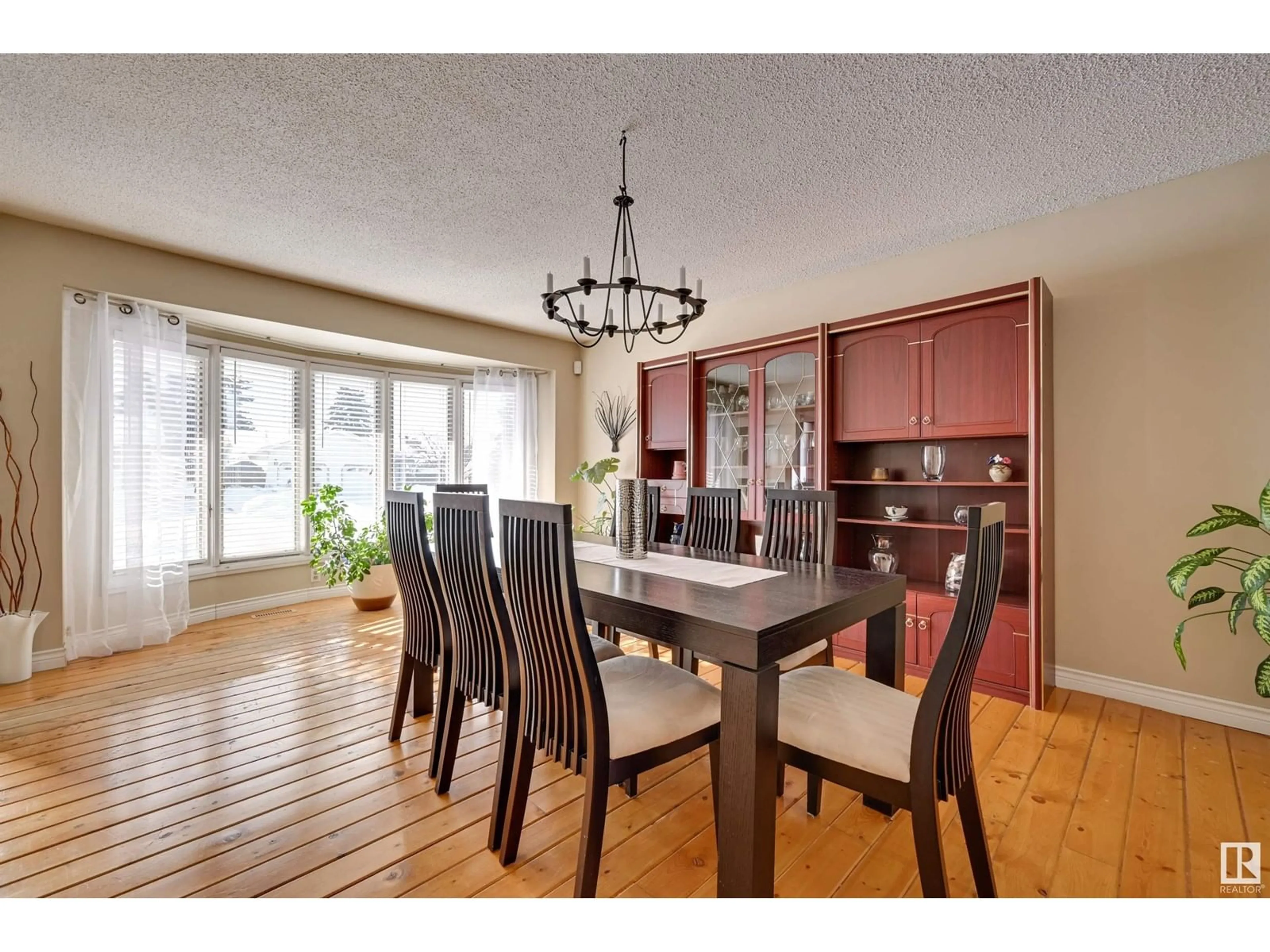 Dining room, wood/laminate floor for 18508 93 AV NW, Edmonton Alberta T5T1V7