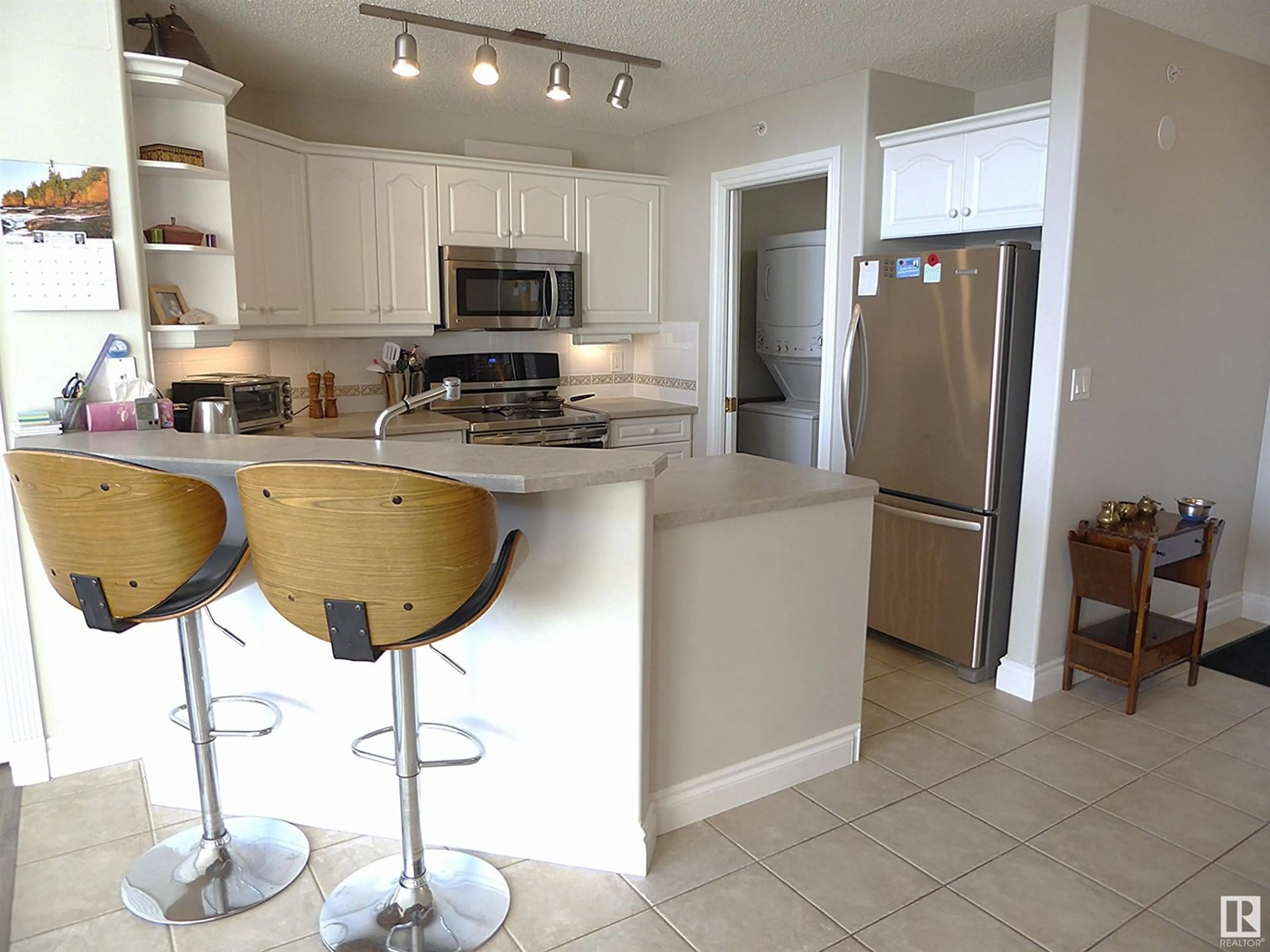 Open concept kitchen, ceramic/tile floor for #426 9730 174 ST NW, Edmonton Alberta T5T6J4