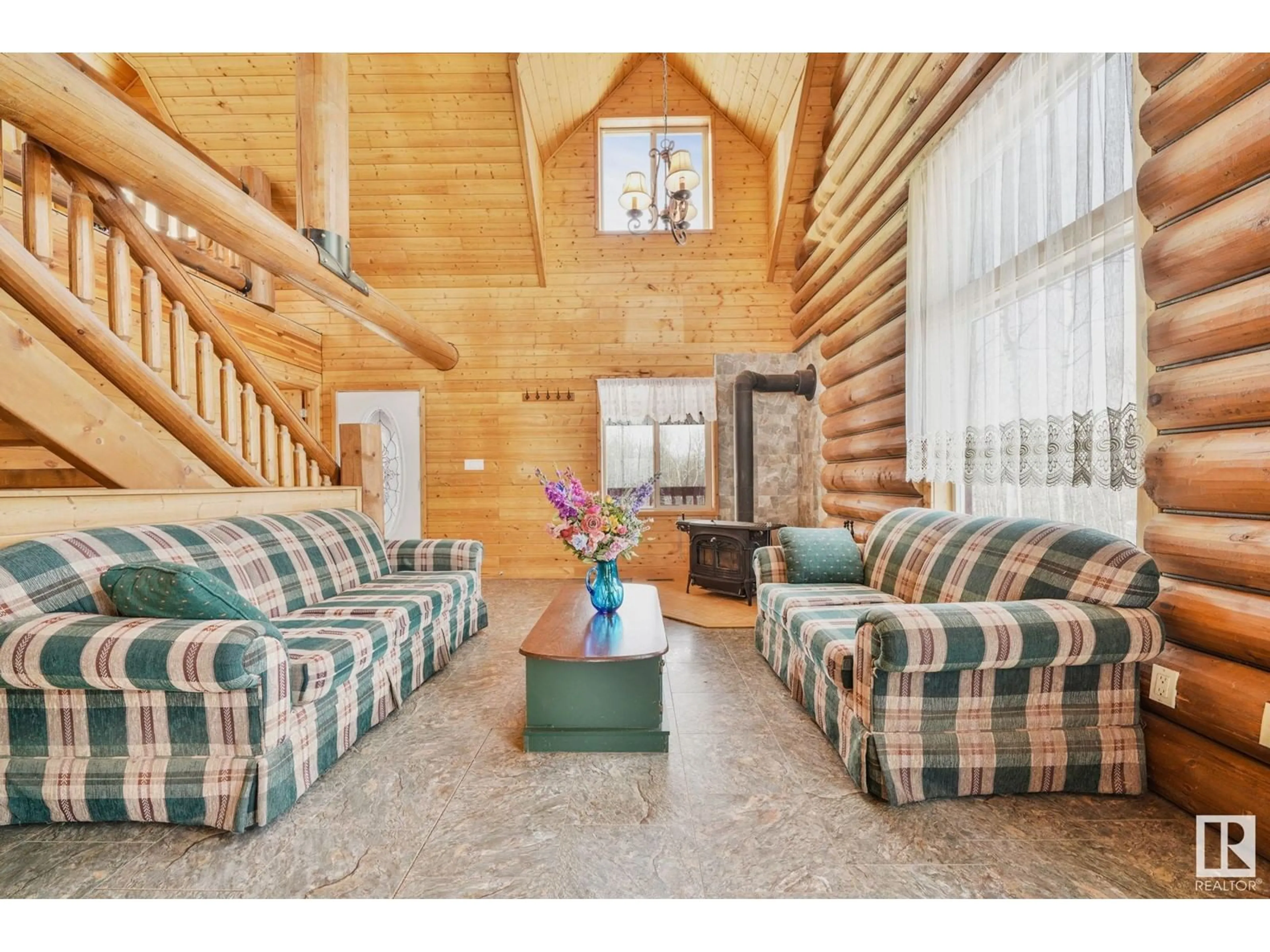 Living room with furniture, wood/laminate floor for #73 52228 RGE ROAD 30, Rural Parkland County Alberta T7Y2M5