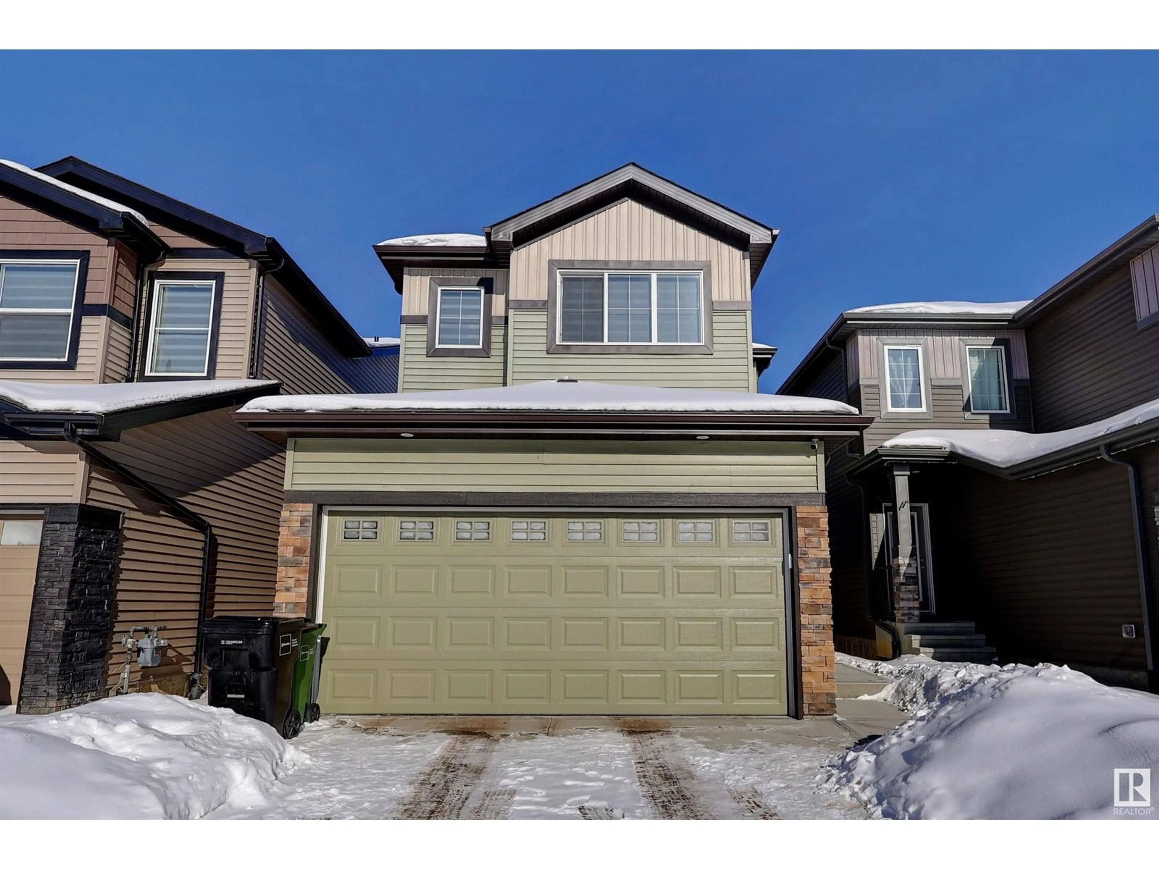 Home with vinyl exterior material, street for 9448 PEAR CR SW SW, Edmonton Alberta T6X2Z5